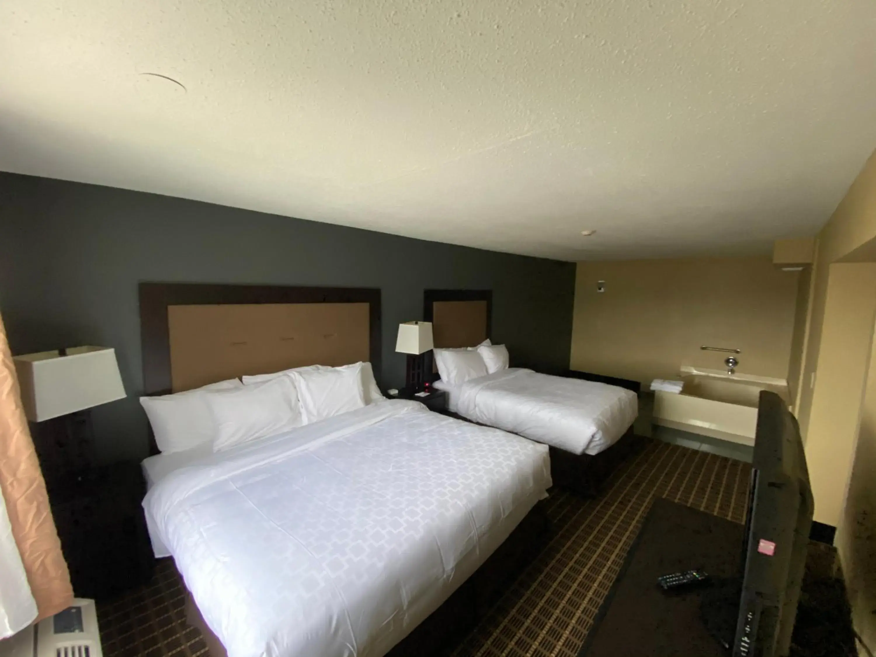 Bed in Clarion Inn & Suites