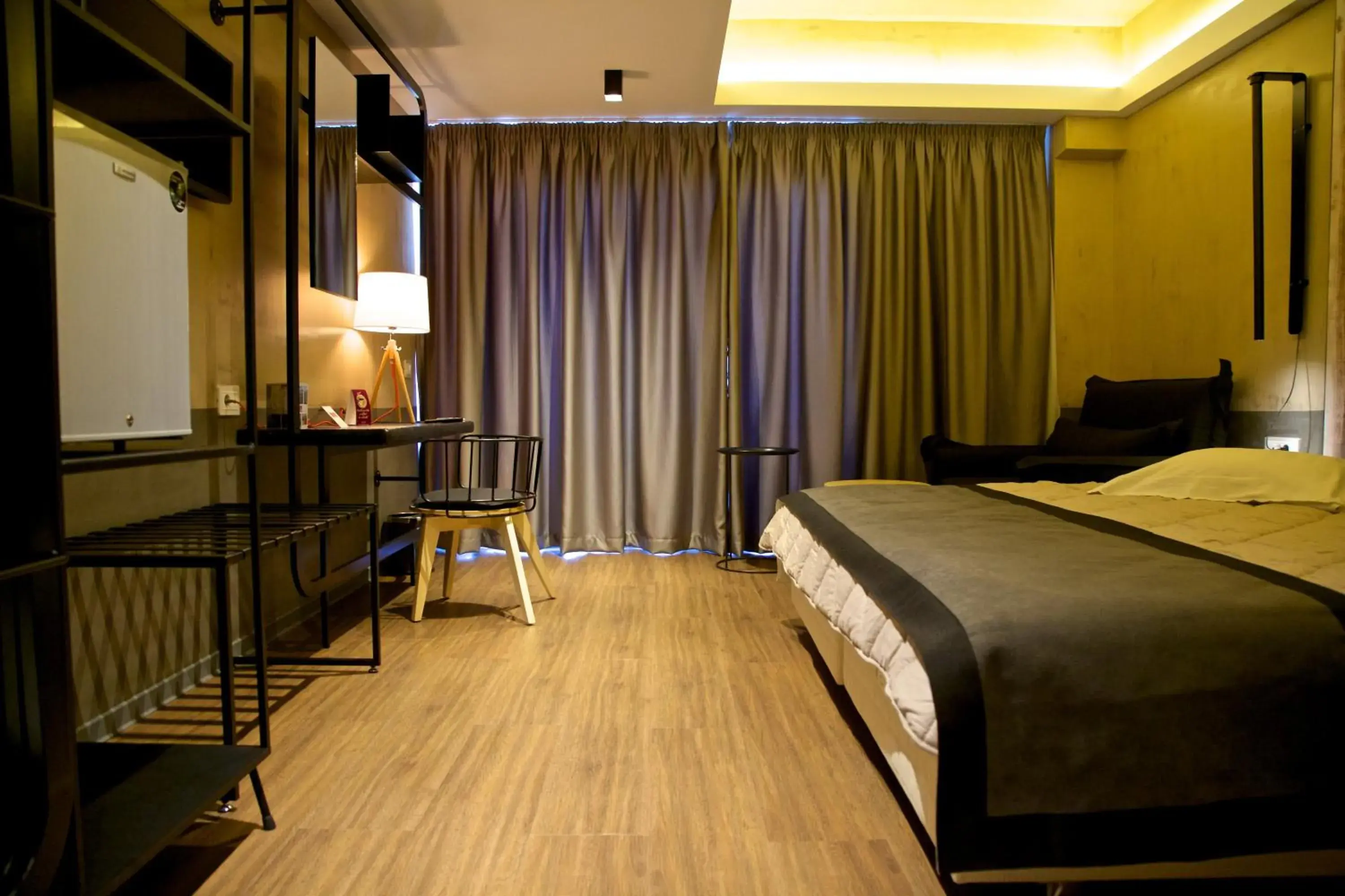 Bedroom in Adonis City Hotel