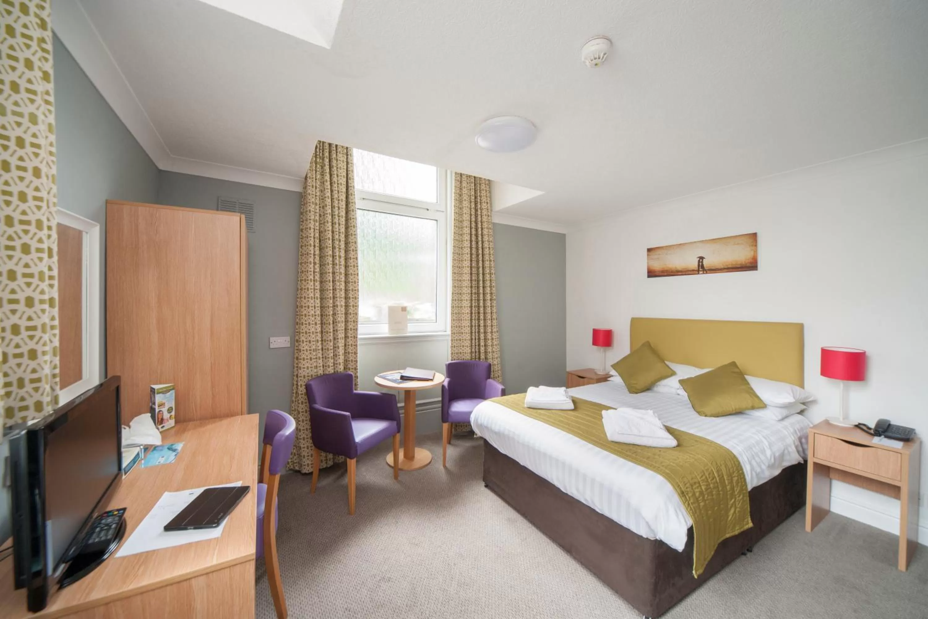 Bedroom in The Grand Atlantic Hotel