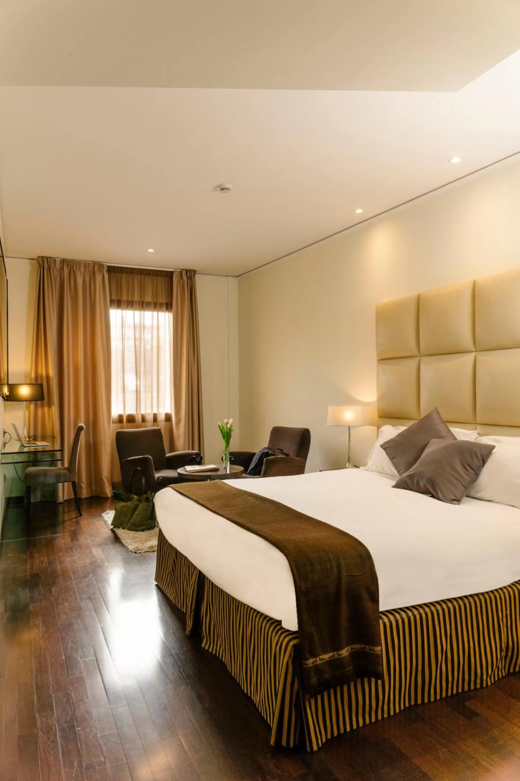 Bed in Cosmopolitan Hotel