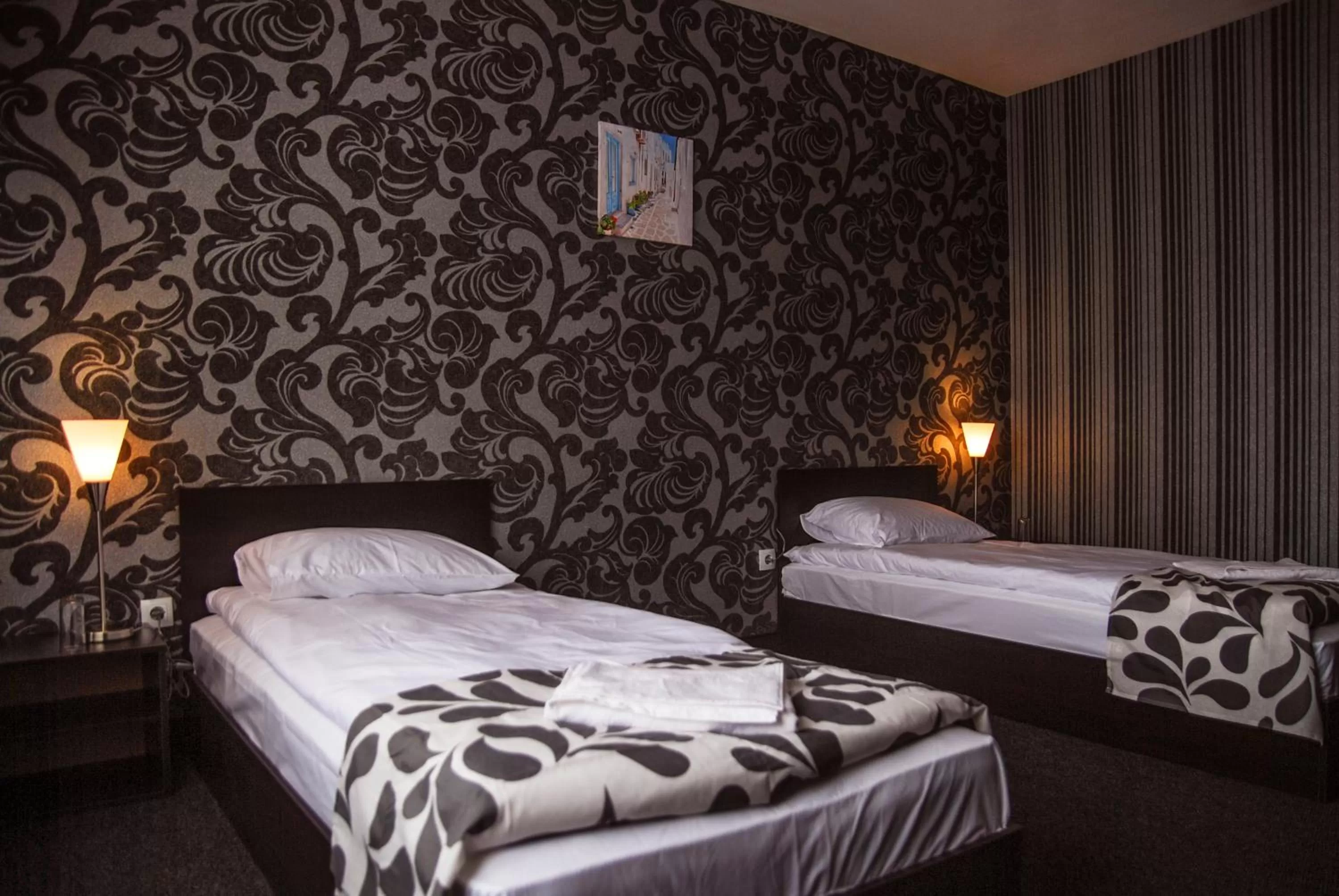 Bed in Elite Spetema Hotel