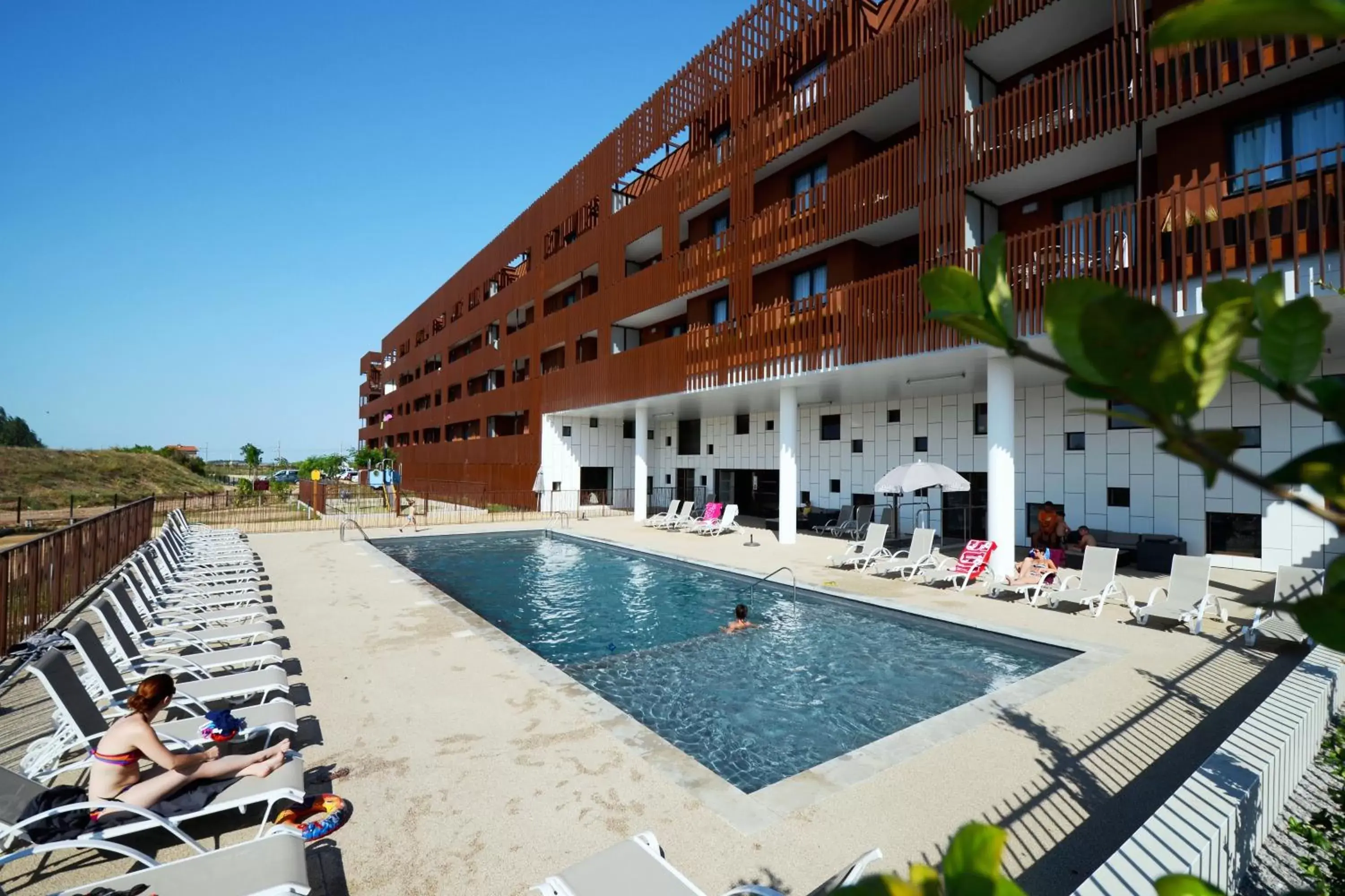 Swimming pool, Property Building in Résidence Odalys Terra Gaia