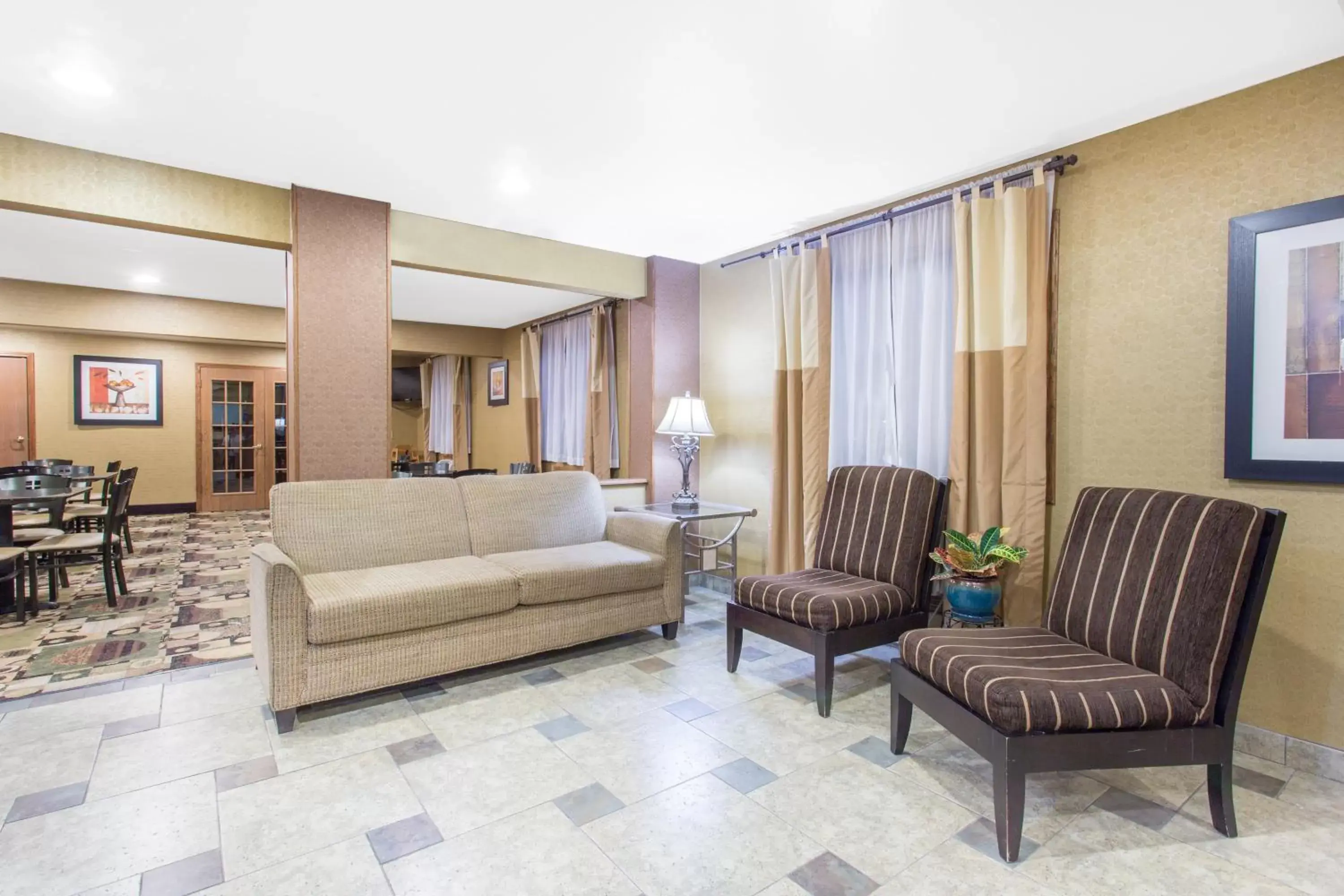 Lobby or reception, Seating Area in Days Inn & Suites by Wyndham Waterloo