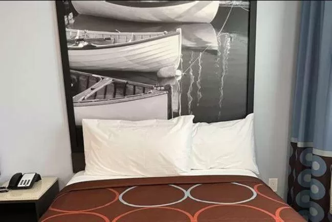Bed in Super 8 by Wyndham Lindenhurst
