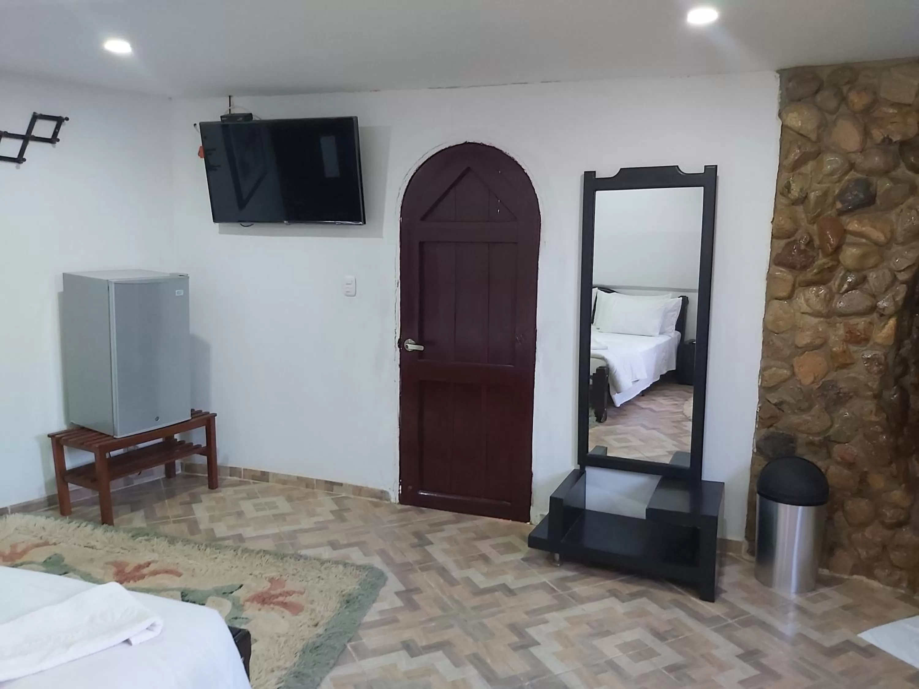 Communal lounge/ TV room, Bed in Eco-Hotel Villa Elina