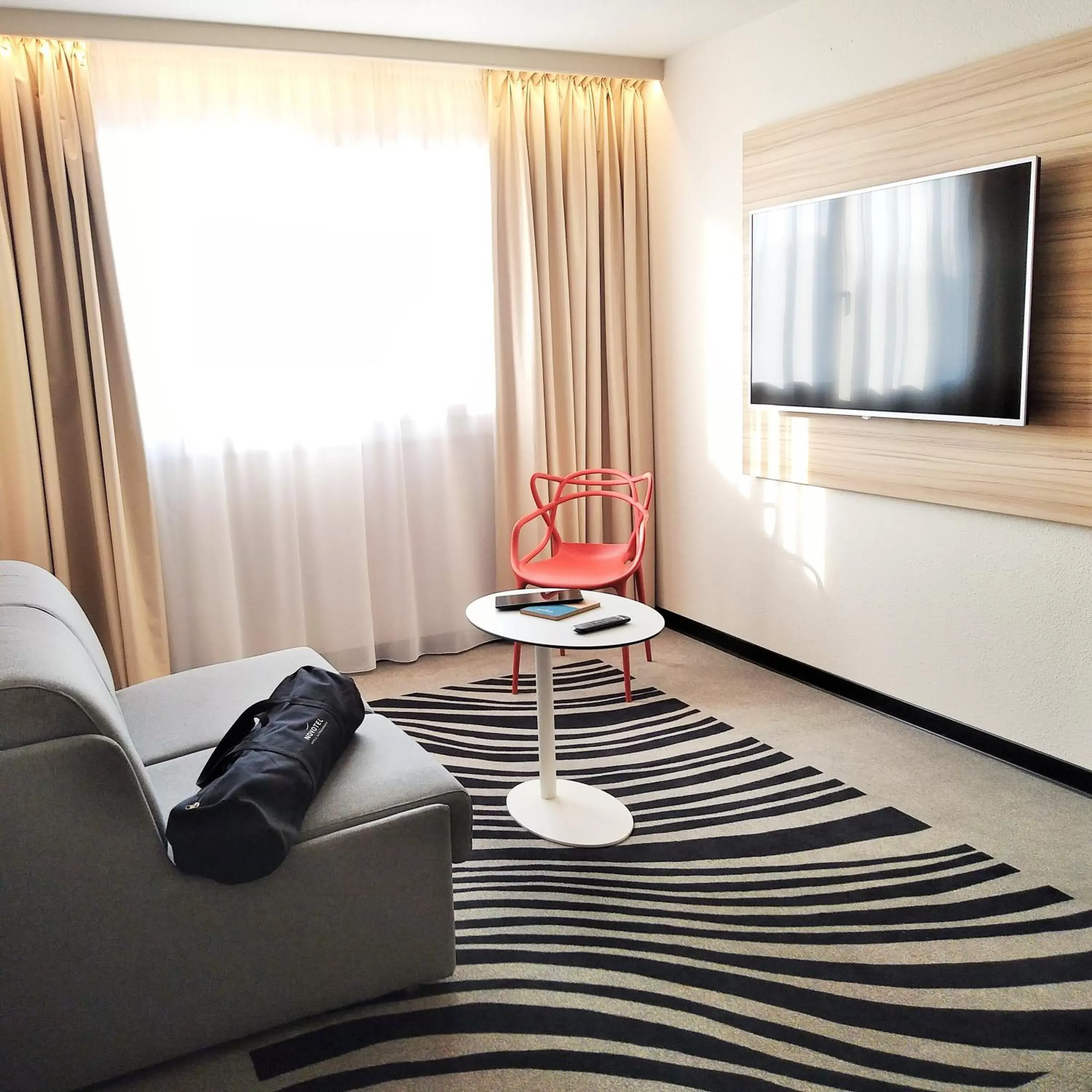 TV and multimedia, Seating Area in Novotel Suites Montpellier Antigone