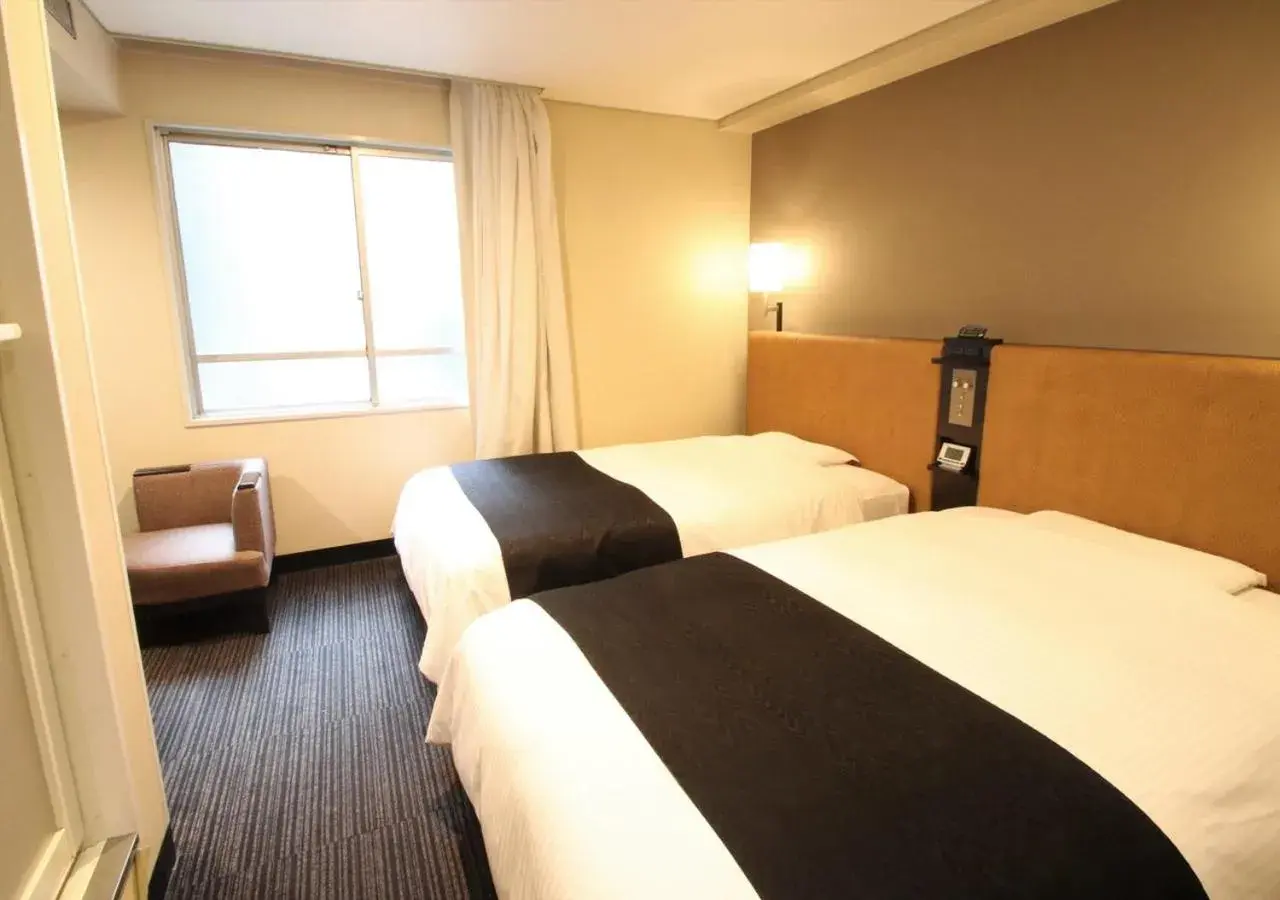 Photo of the whole room, Bed in Apa Hotel Hiroshima-Ekimae