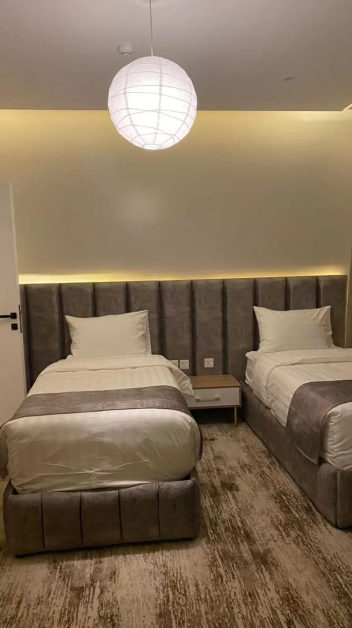 Bed in فندق جولدن الأندلس أبها - Golden Andalus Hotel Abha