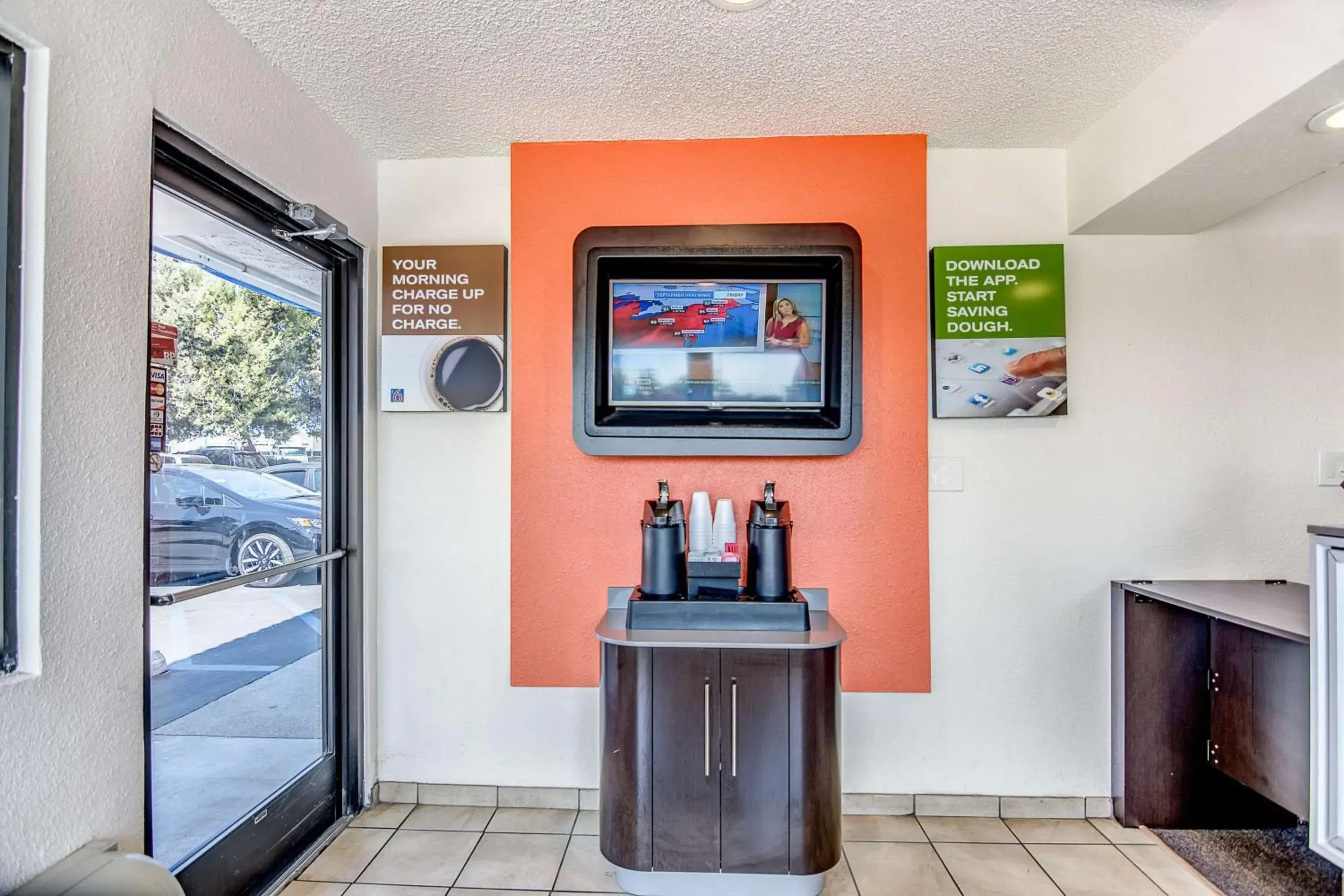 Communal lounge/ TV room, Lobby/Reception in Motel 6-Stockton, CA - Charter Way West