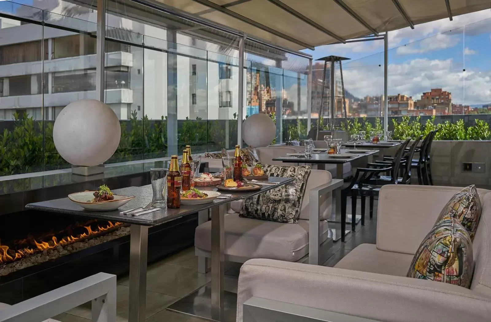 Balcony/Terrace, Restaurant/Places to Eat in Hotel 100 Luxury Suites by Preferred