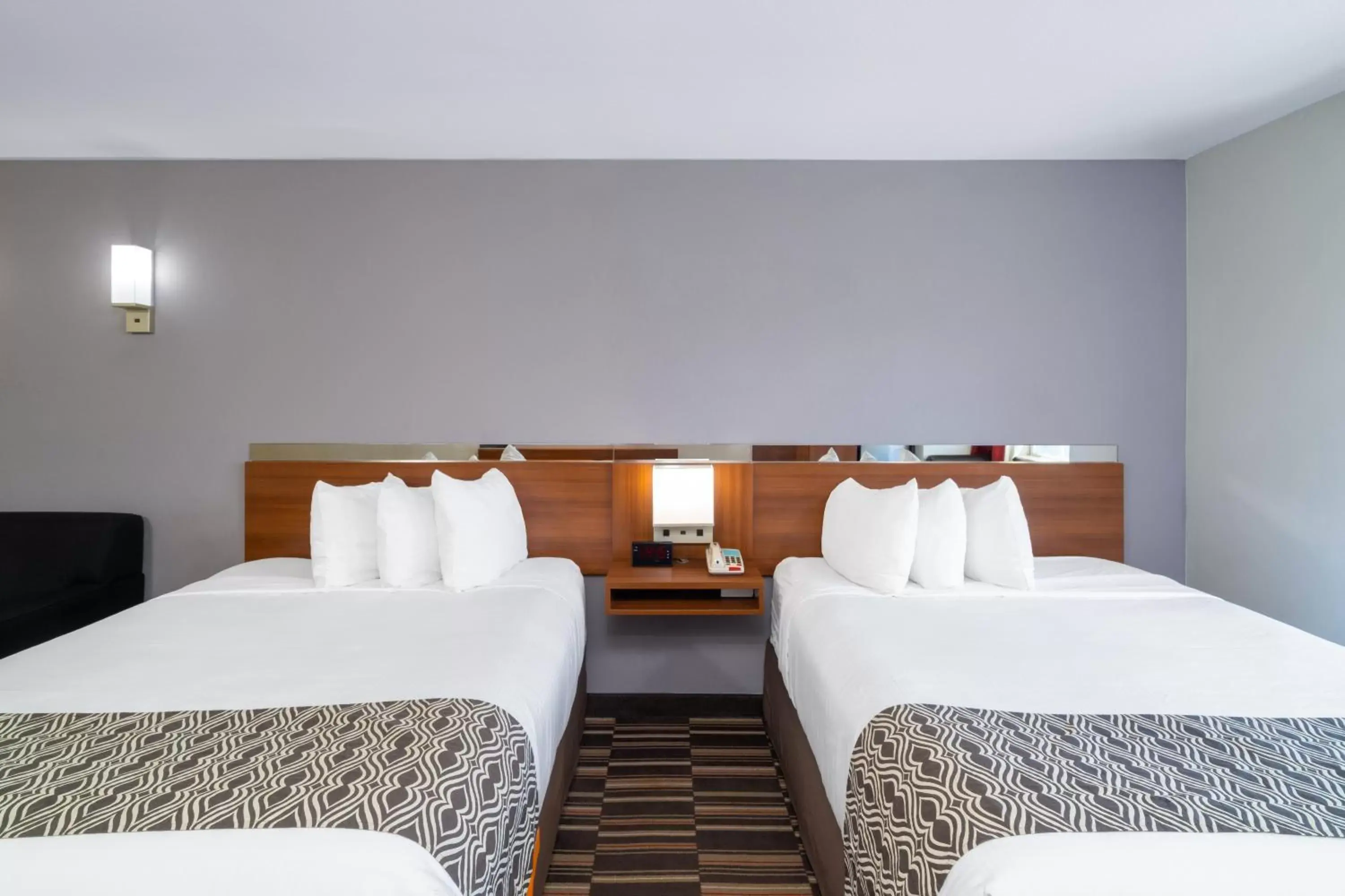 Bed in Microtel Inn & Suites by Wyndham Savannah/Pooler