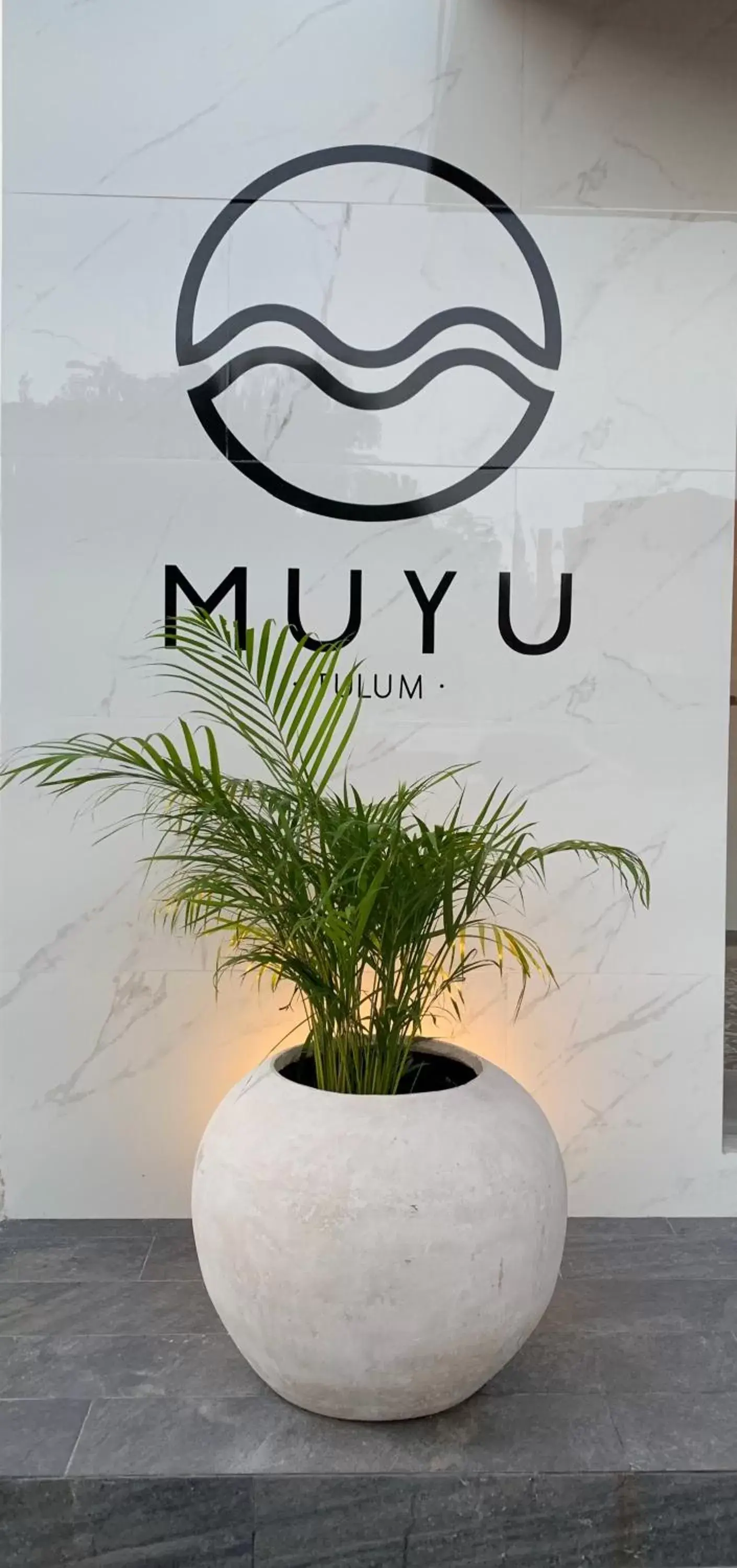 Property logo or sign in Hotel Muyu Tulum