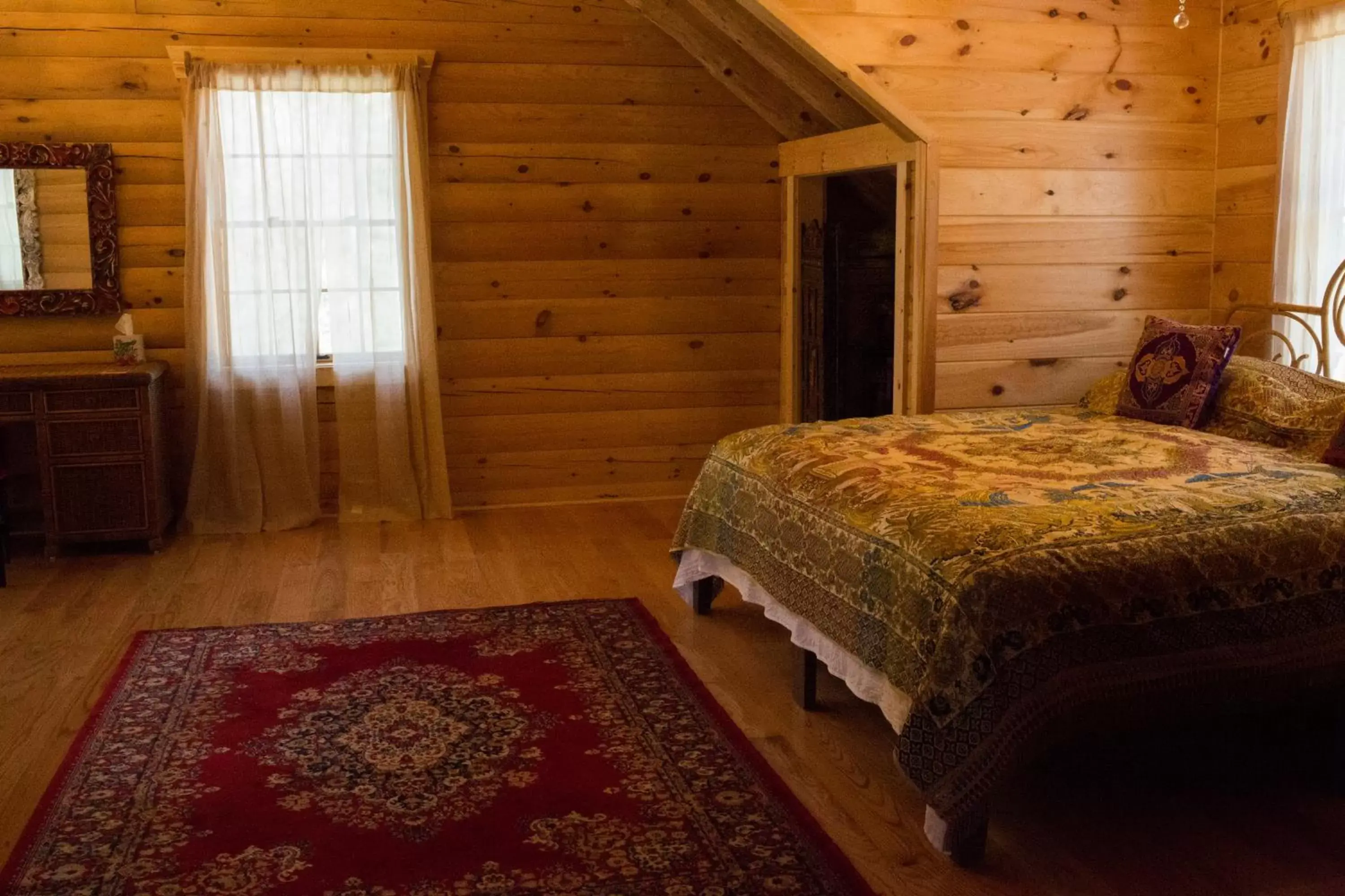 Bed in Log Country Inn Bed and Breakfast of Ithaca