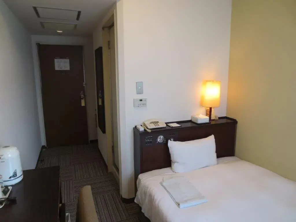 Bed in Nest Hotel Kumamoto