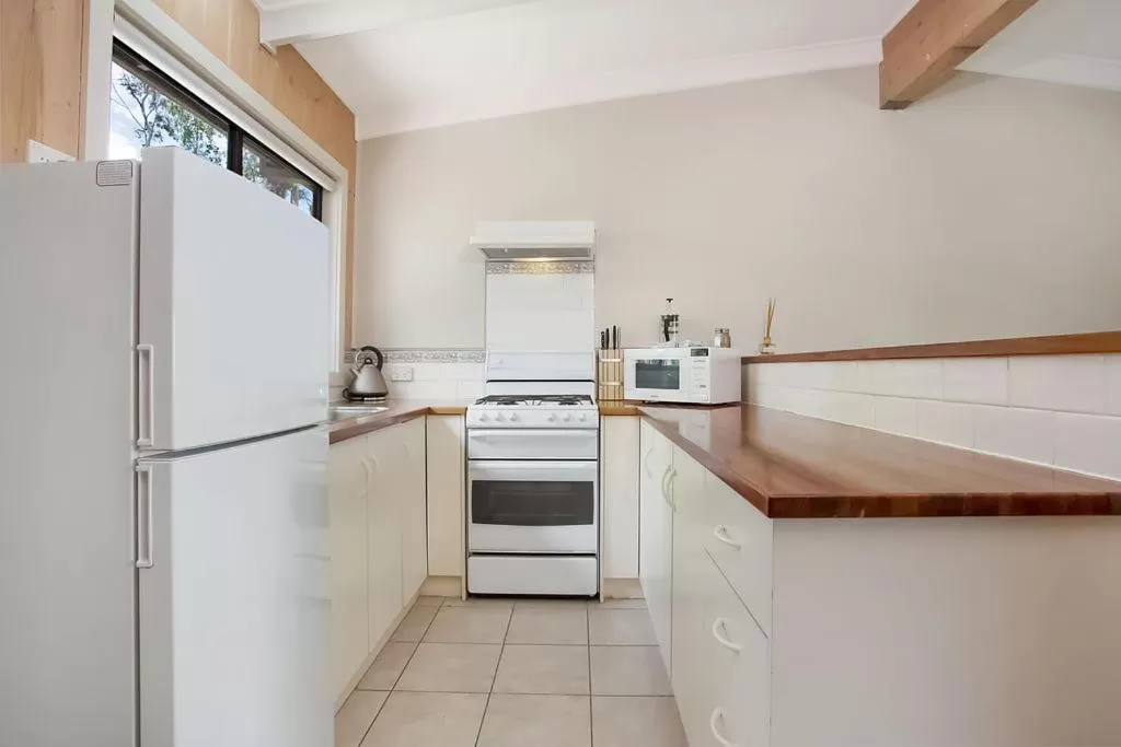 Kitchen or kitchenette in Beacon Point Ocean View Villas