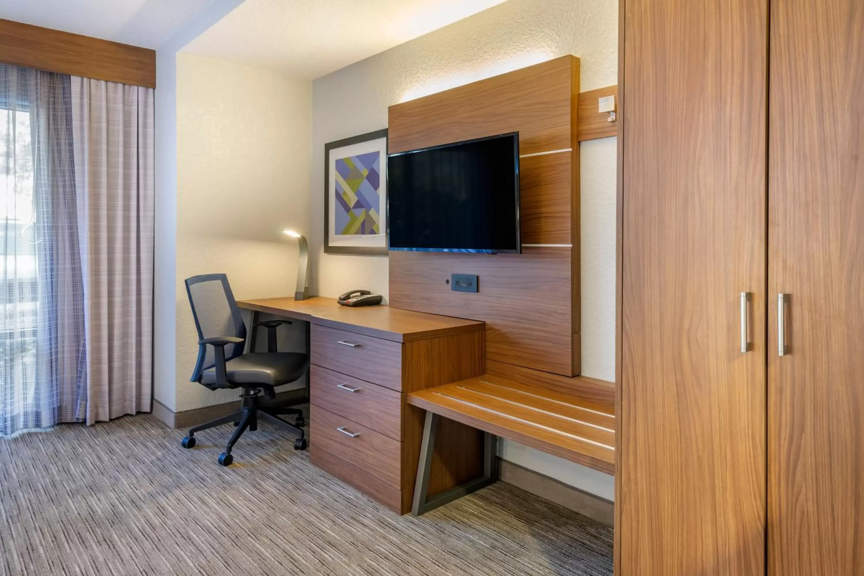 Photo of the whole room, TV/Entertainment Center in Holiday Inn Express Cape Coral-Fort Myers Area, an IHG Hotel