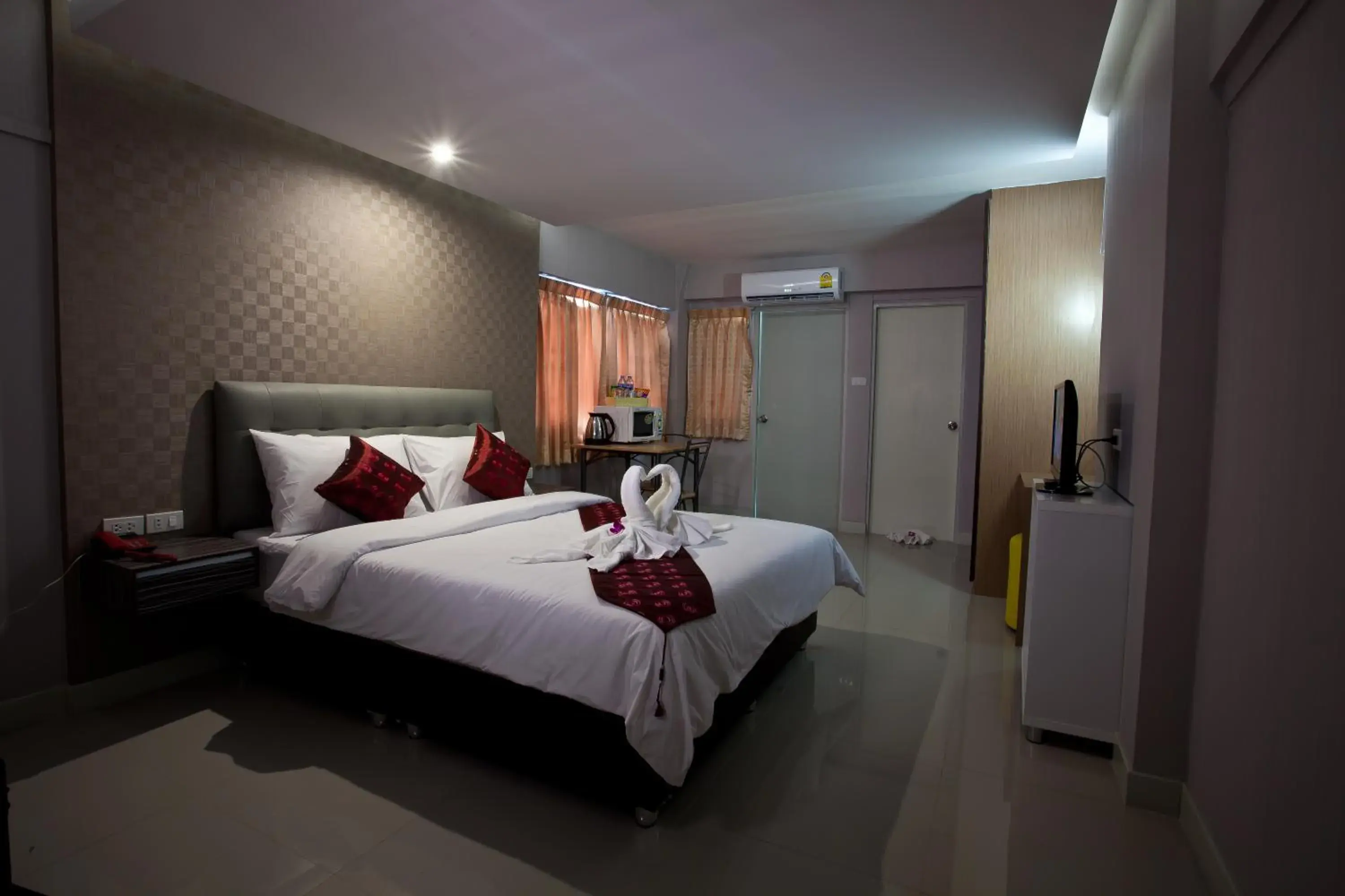 Photo of the whole room, Bed in Nrc Residence Suvarnabhumi