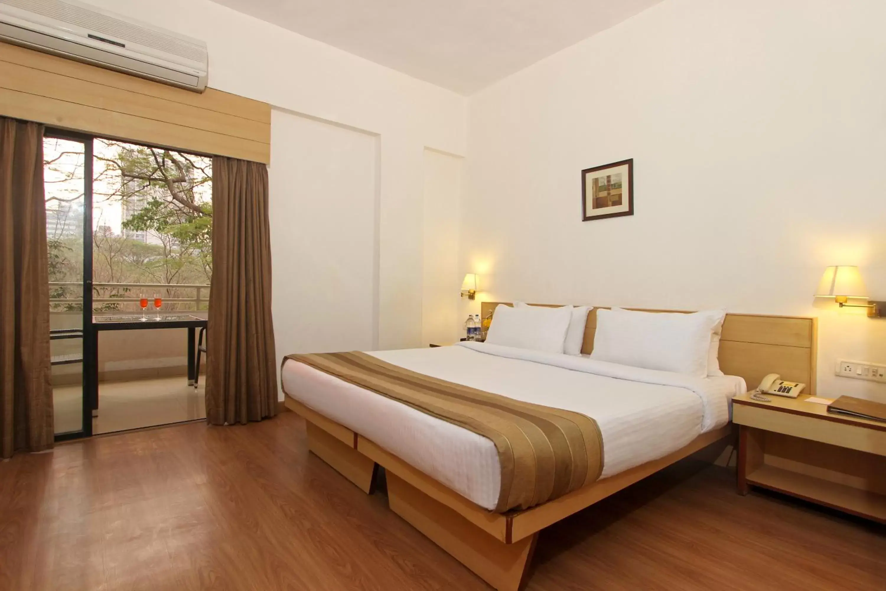 Balcony/Terrace, Bed in Hotel Phoenix Koregaon Park Balcony/Terrace, Bed in Hotel Phoenix Koregaon Park