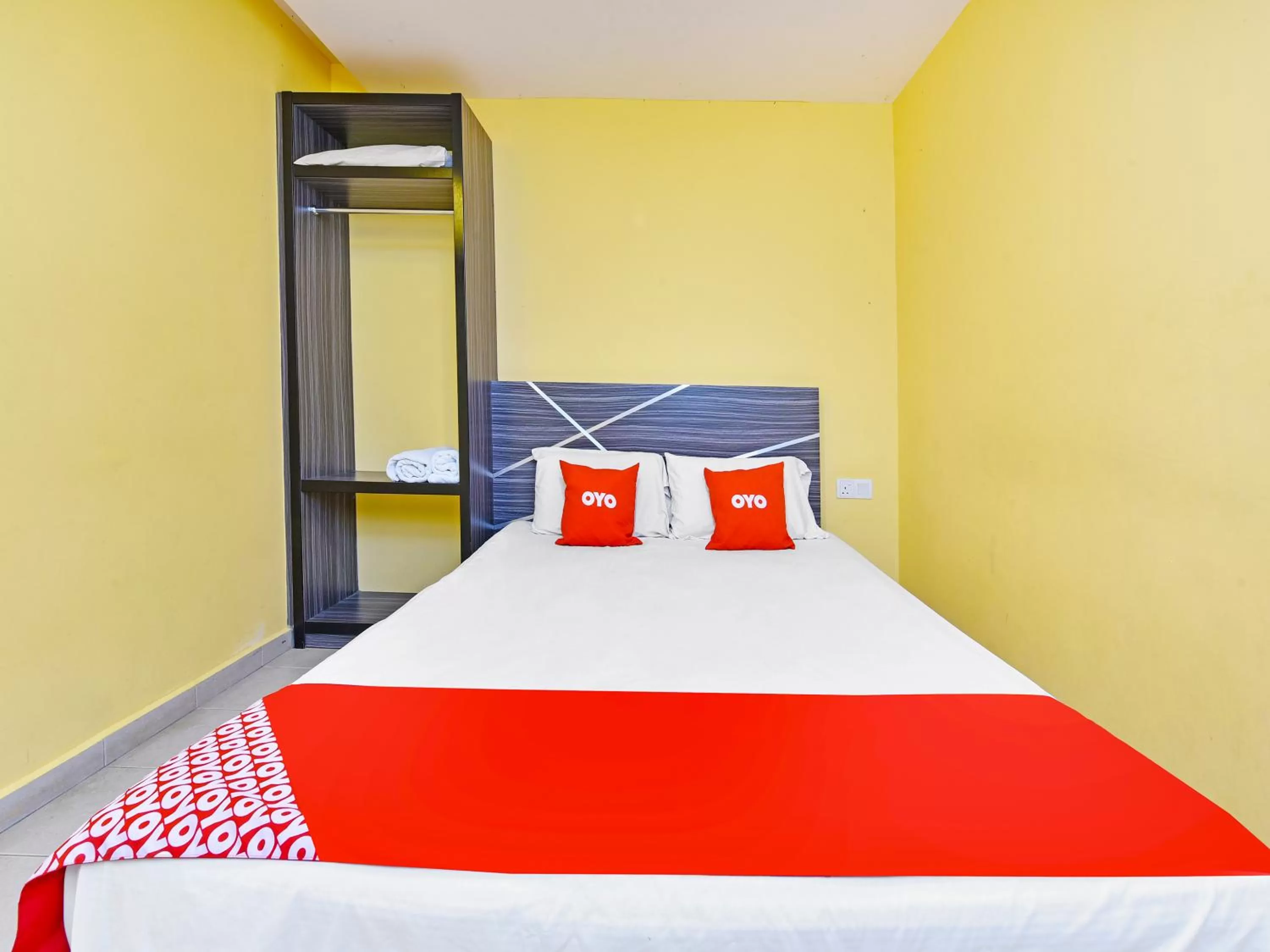 Bedroom in OYO 90521 De Mawardah Inn