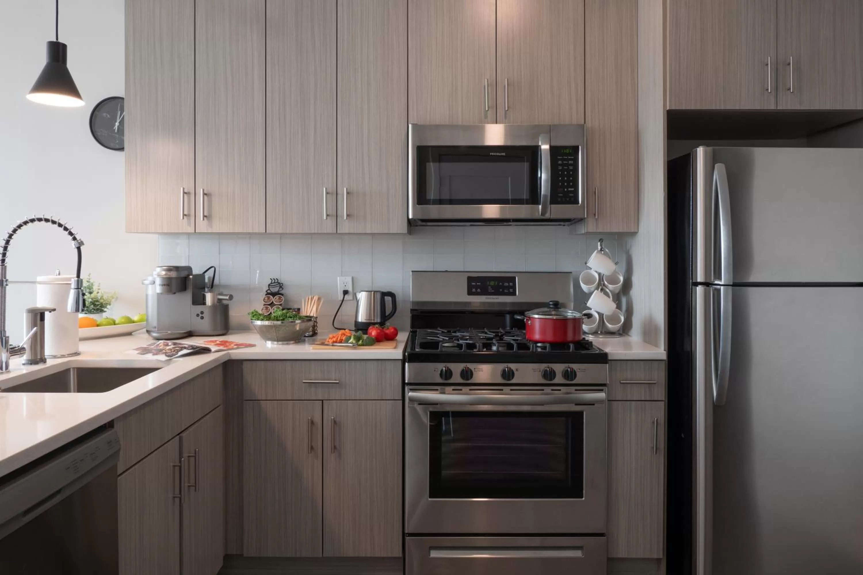 Kitchen or kitchenette in Luxury Furnished Apartments by Hyatus Downtown at Yale