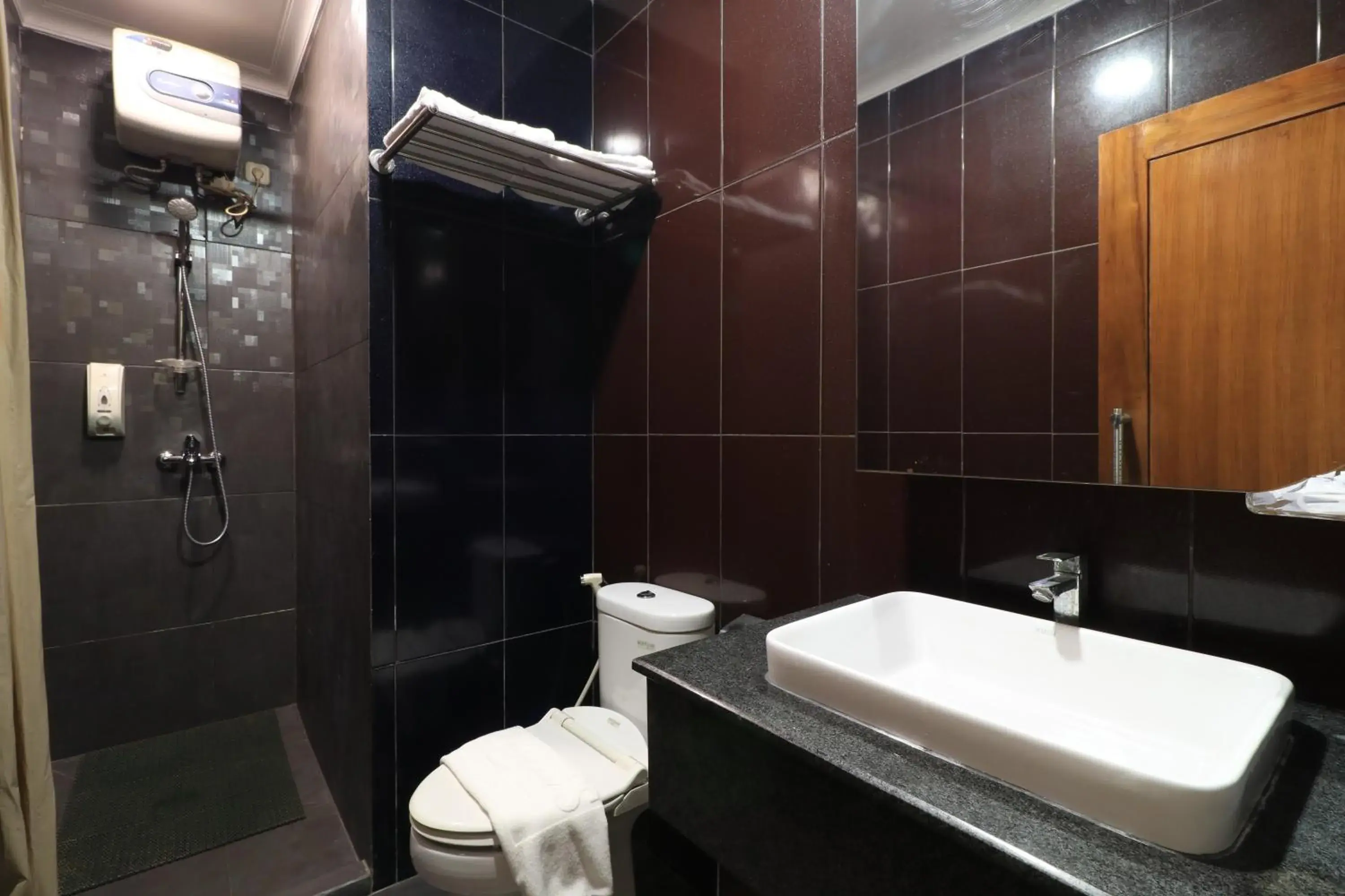 Bathroom in Coins Hotel Jakarta