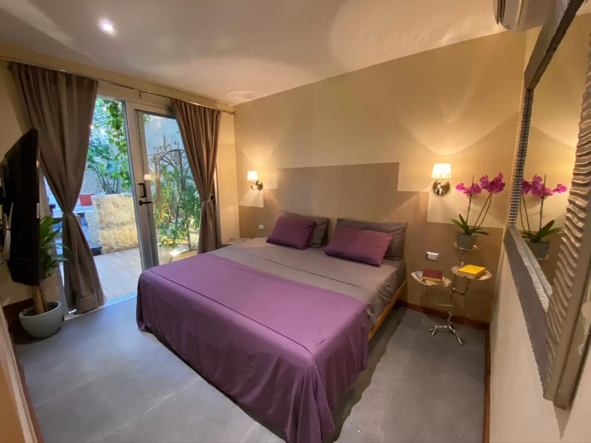 Bed in Casarte Boutique Hotel