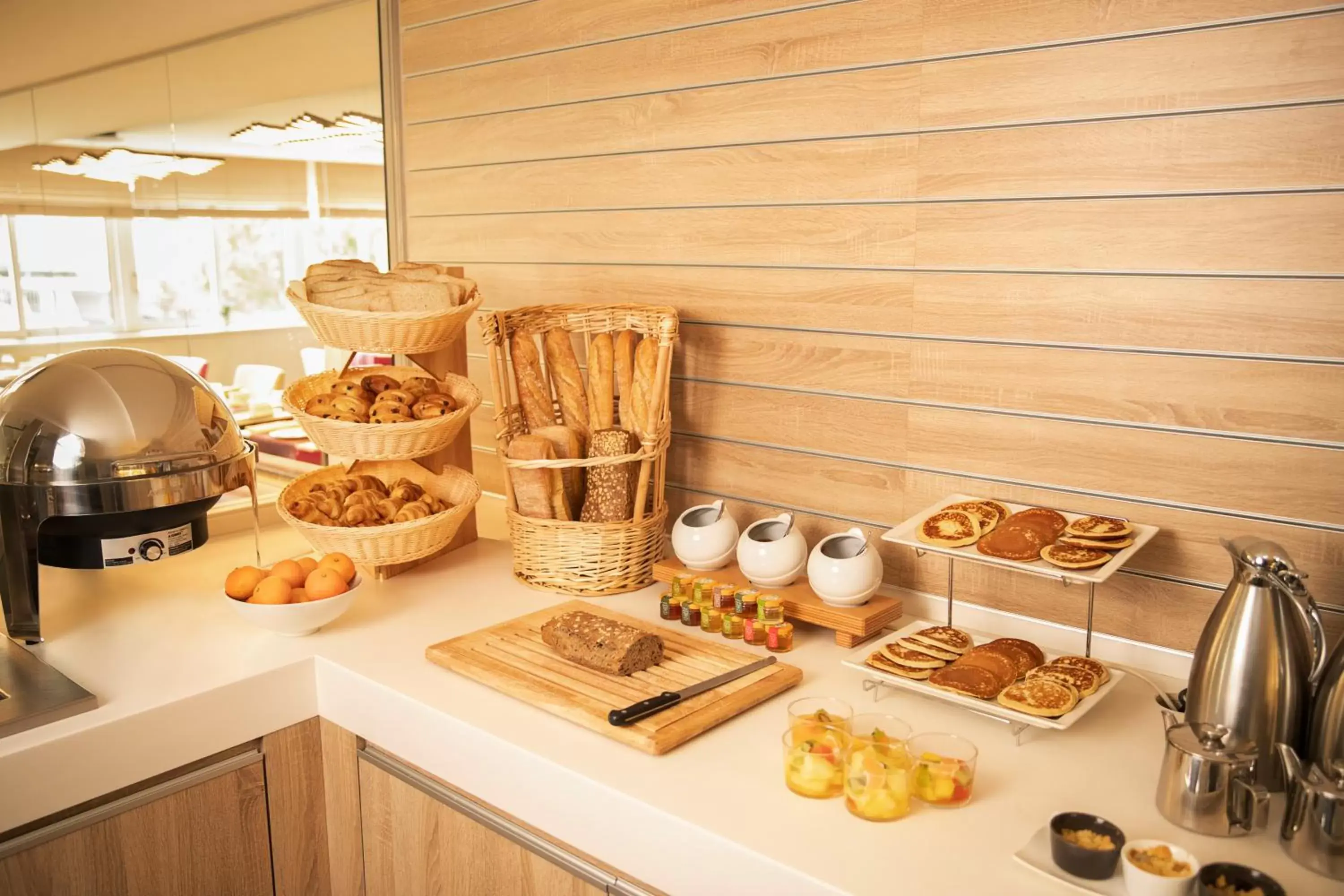 Continental breakfast in Hôtel Le B d'Arcachon by Inwood Hotels