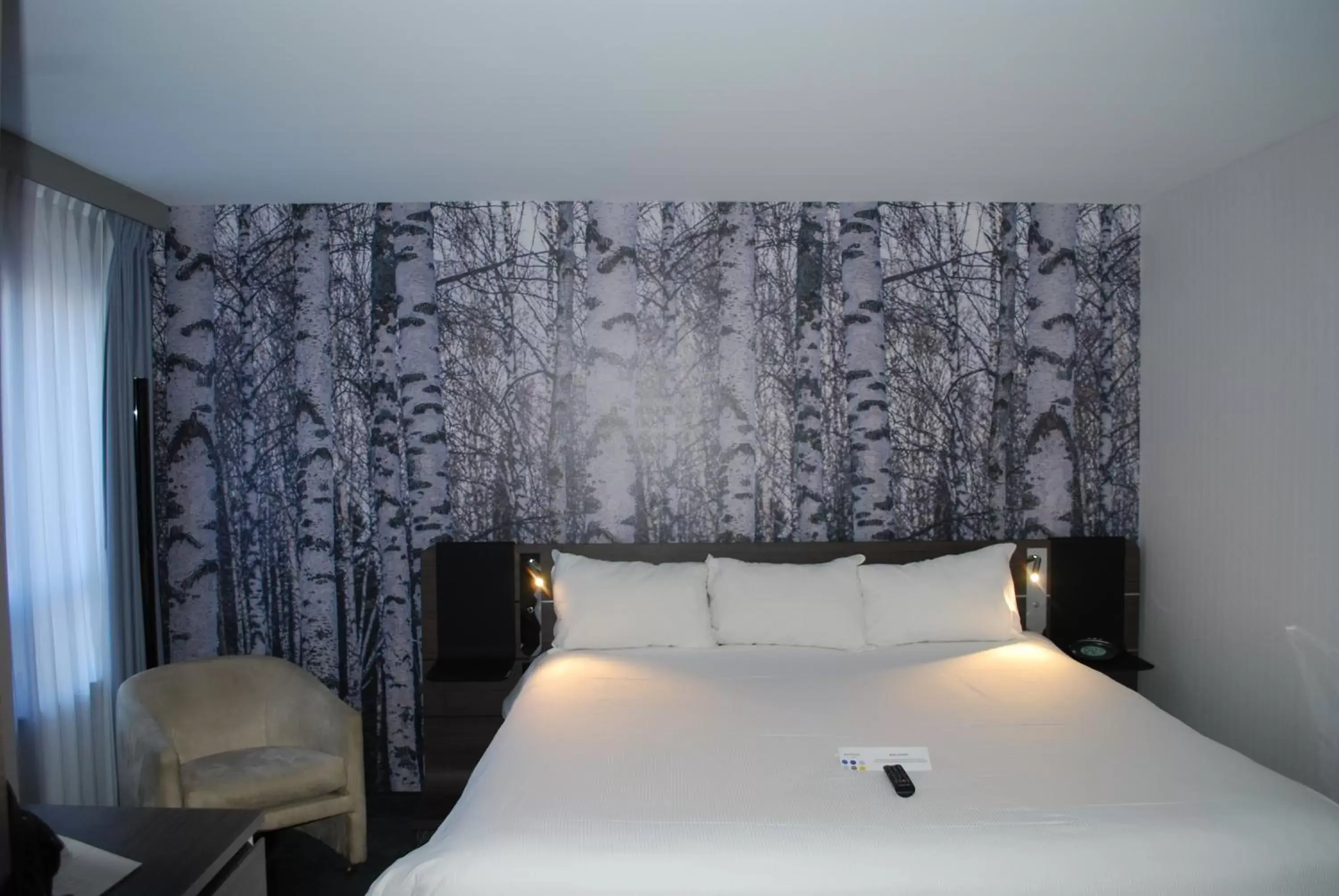 Bed in Novotel Ottawa City Centre Hotel