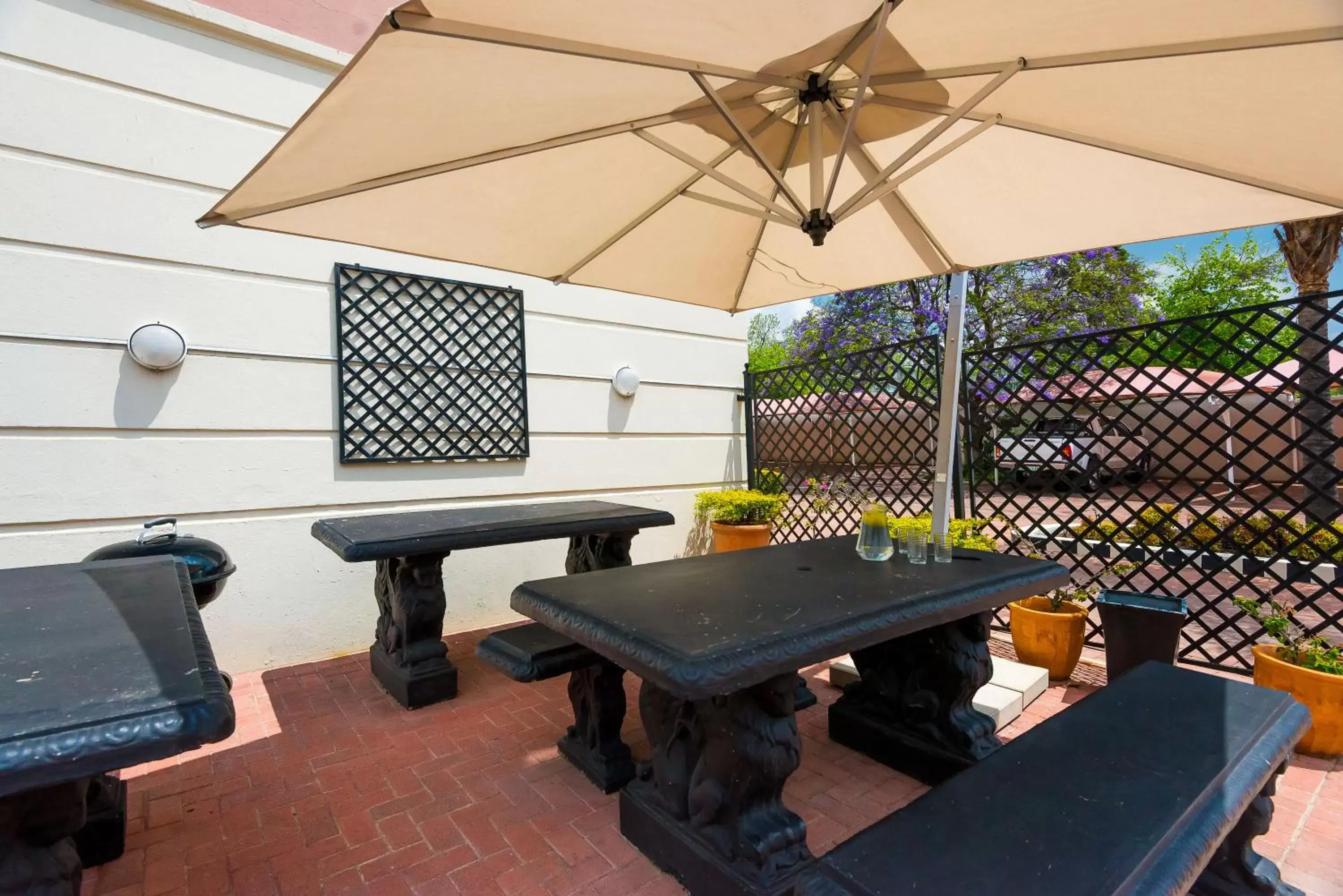 Patio, BBQ Facilities in Premiere Classe Apartment Hotel