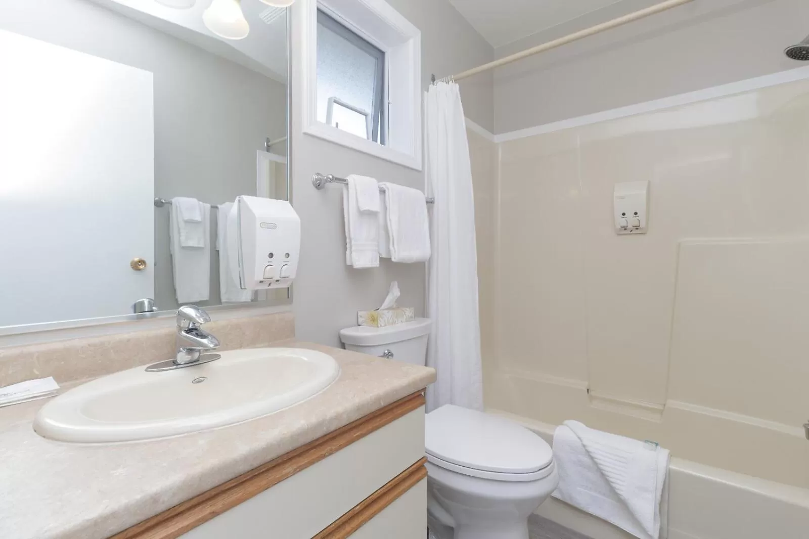 Bathroom in The Cedarwood Inn & Suites