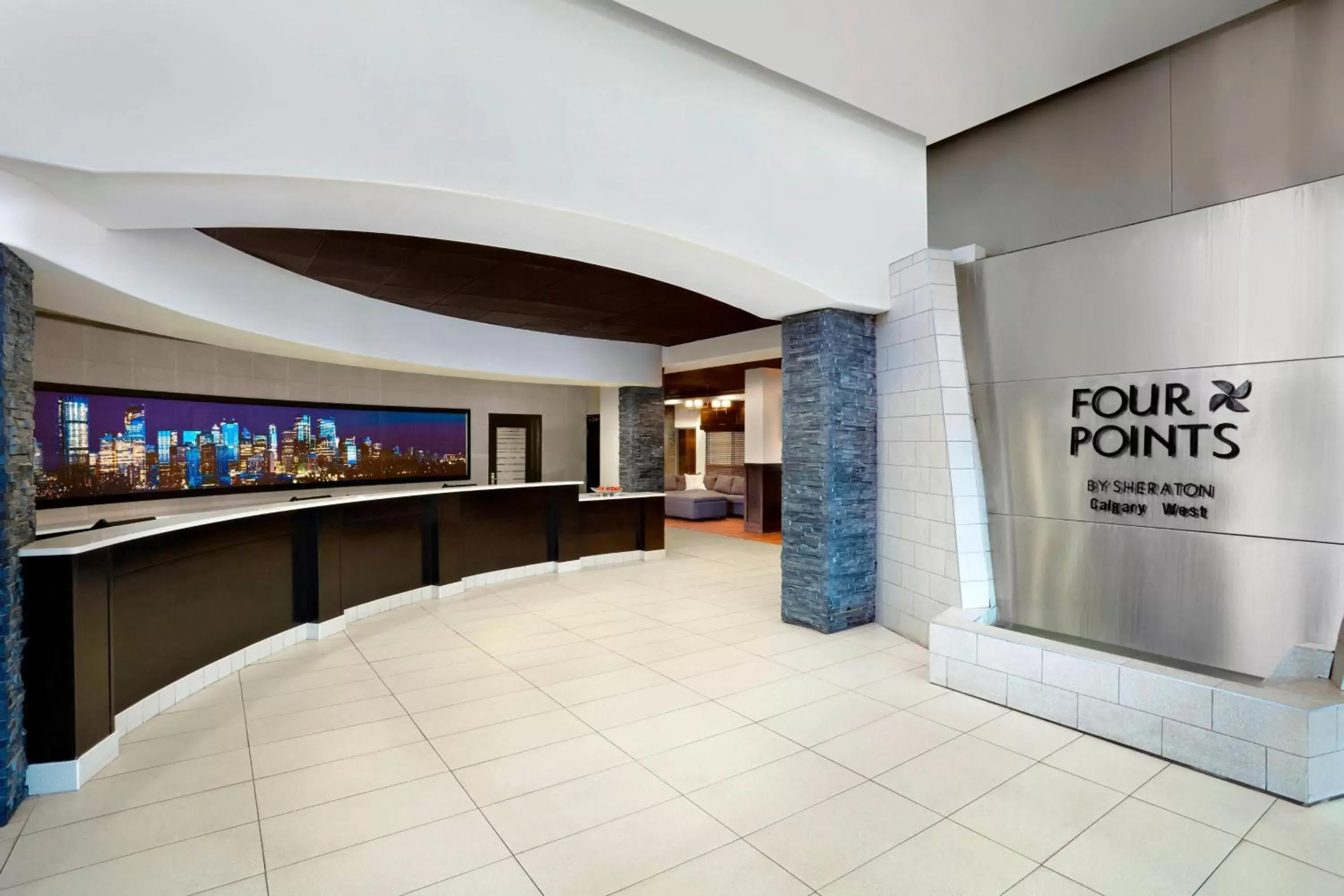 Bedroom, Lobby/Reception in Four Points by Sheraton Hotel & Suites Calgary West
