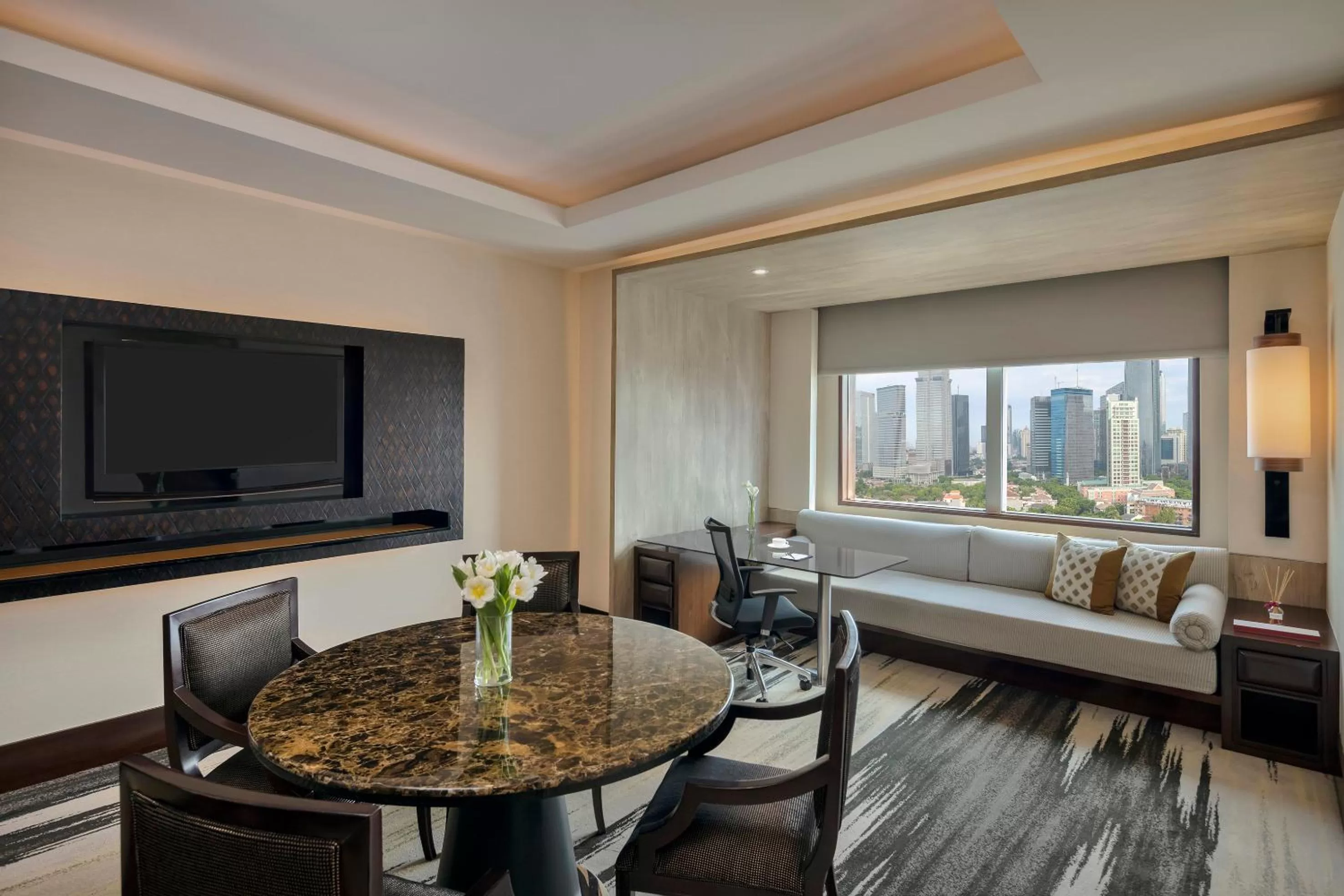 Living room, Bed in Gran Melia Jakarta