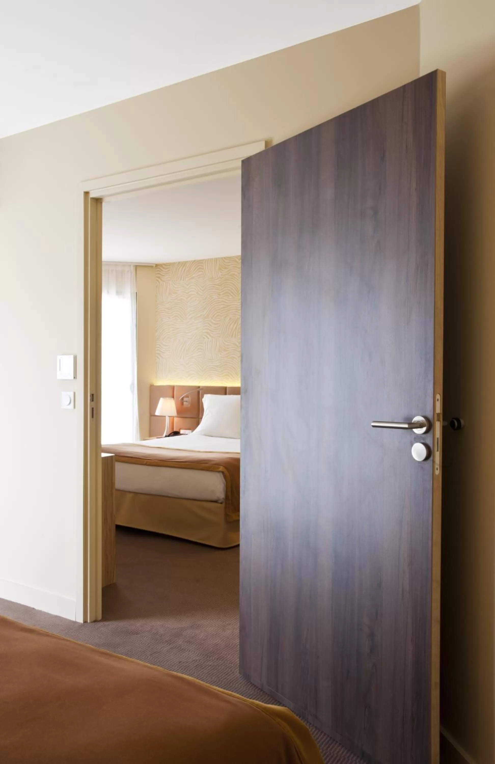 Bed in Golden Tulip Avignon Le Paradou