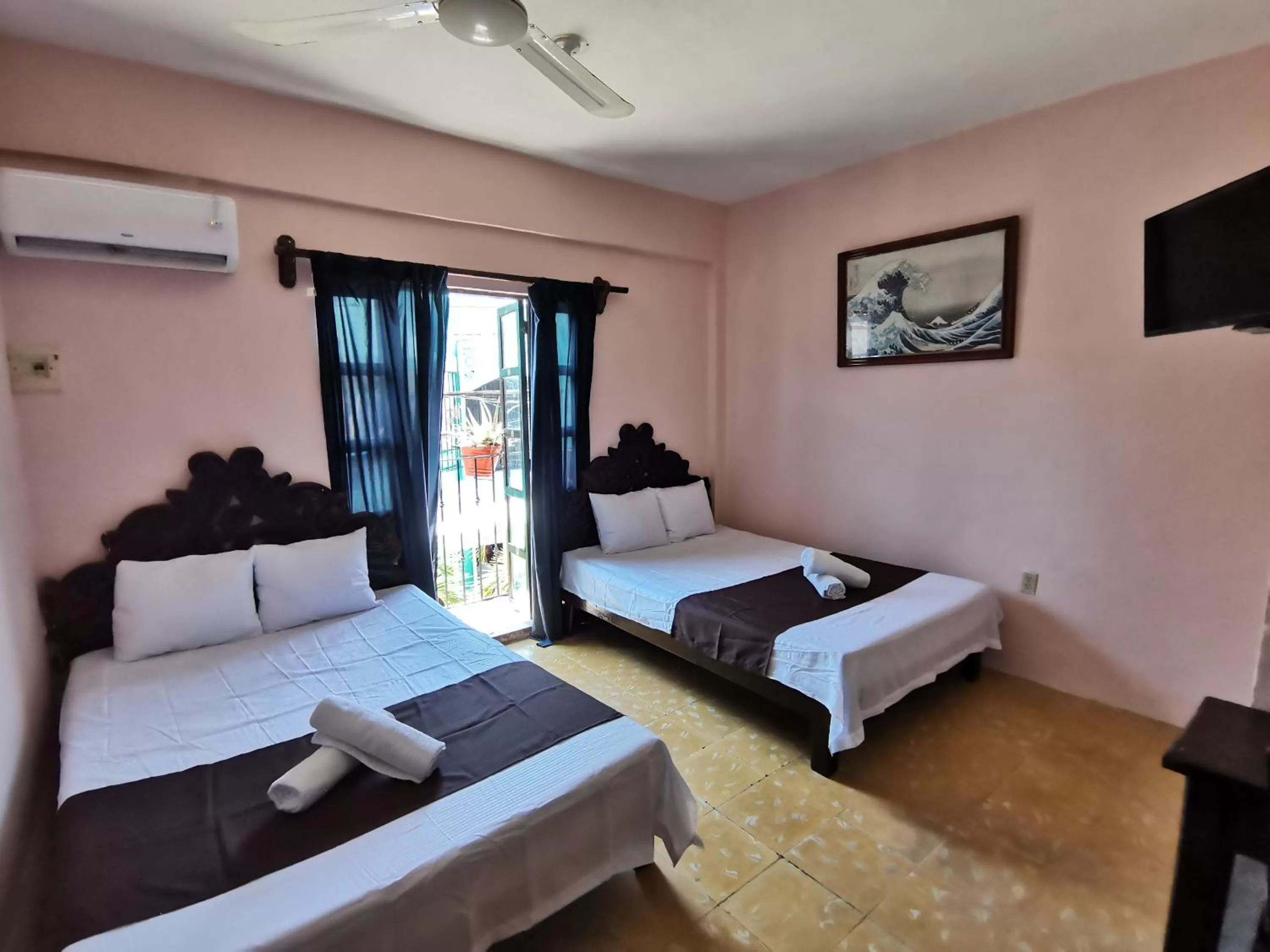 Bed in Hotel Colonial San Carlos