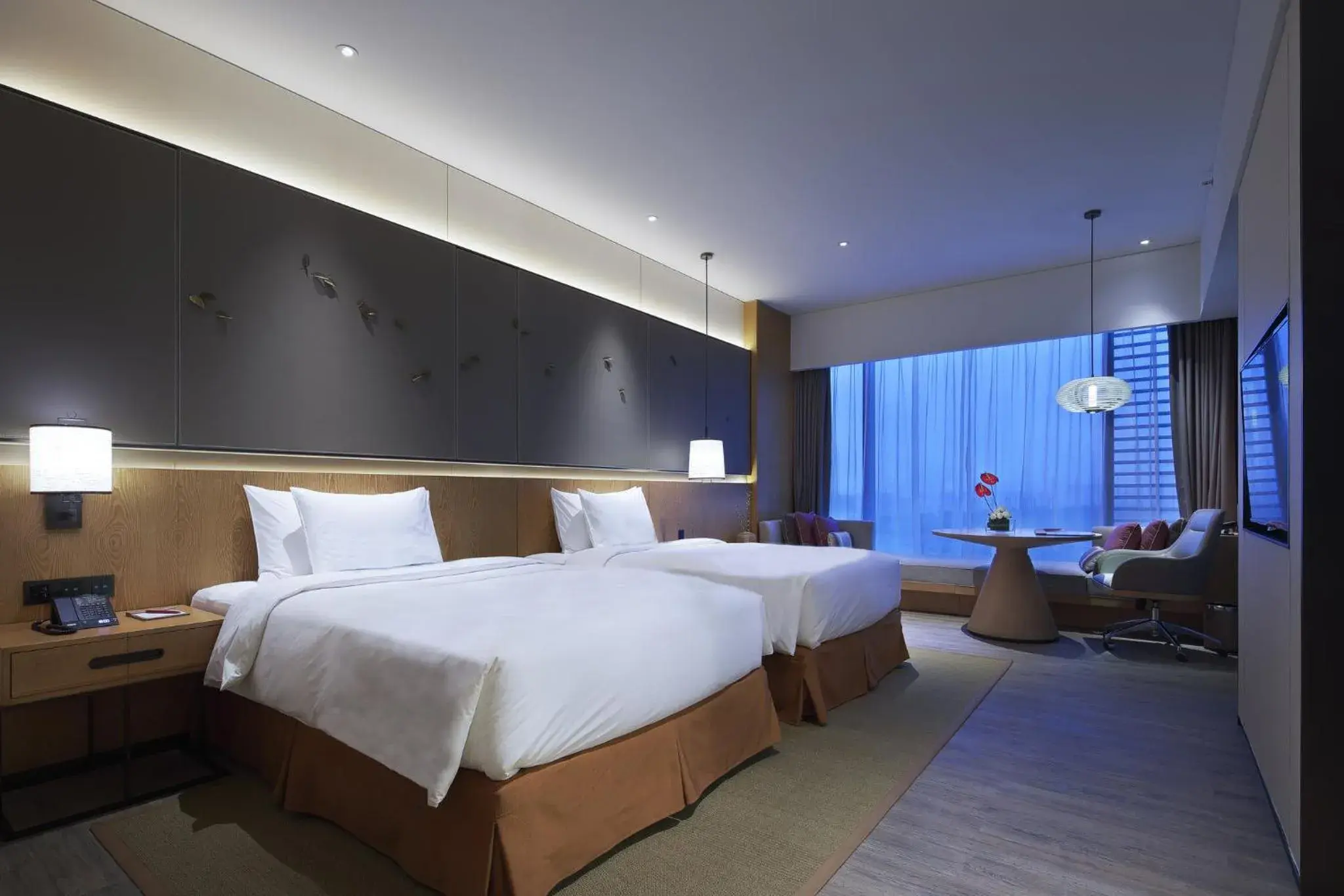 Photo of the whole room, Bed in Crowne Plaza Nanchang Wanli, an IHG Hotel