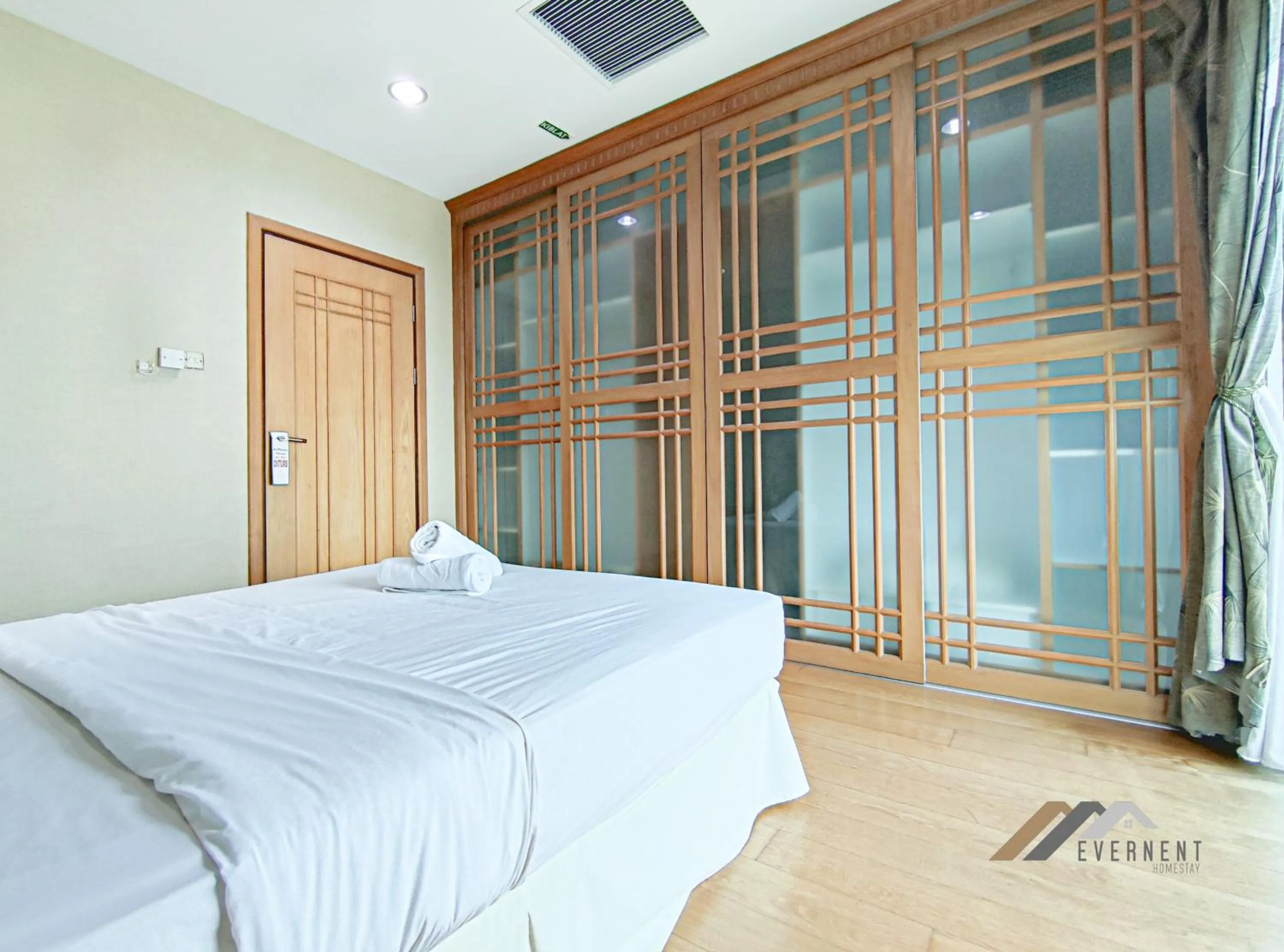 Bed in Mciti Suites by Evernent