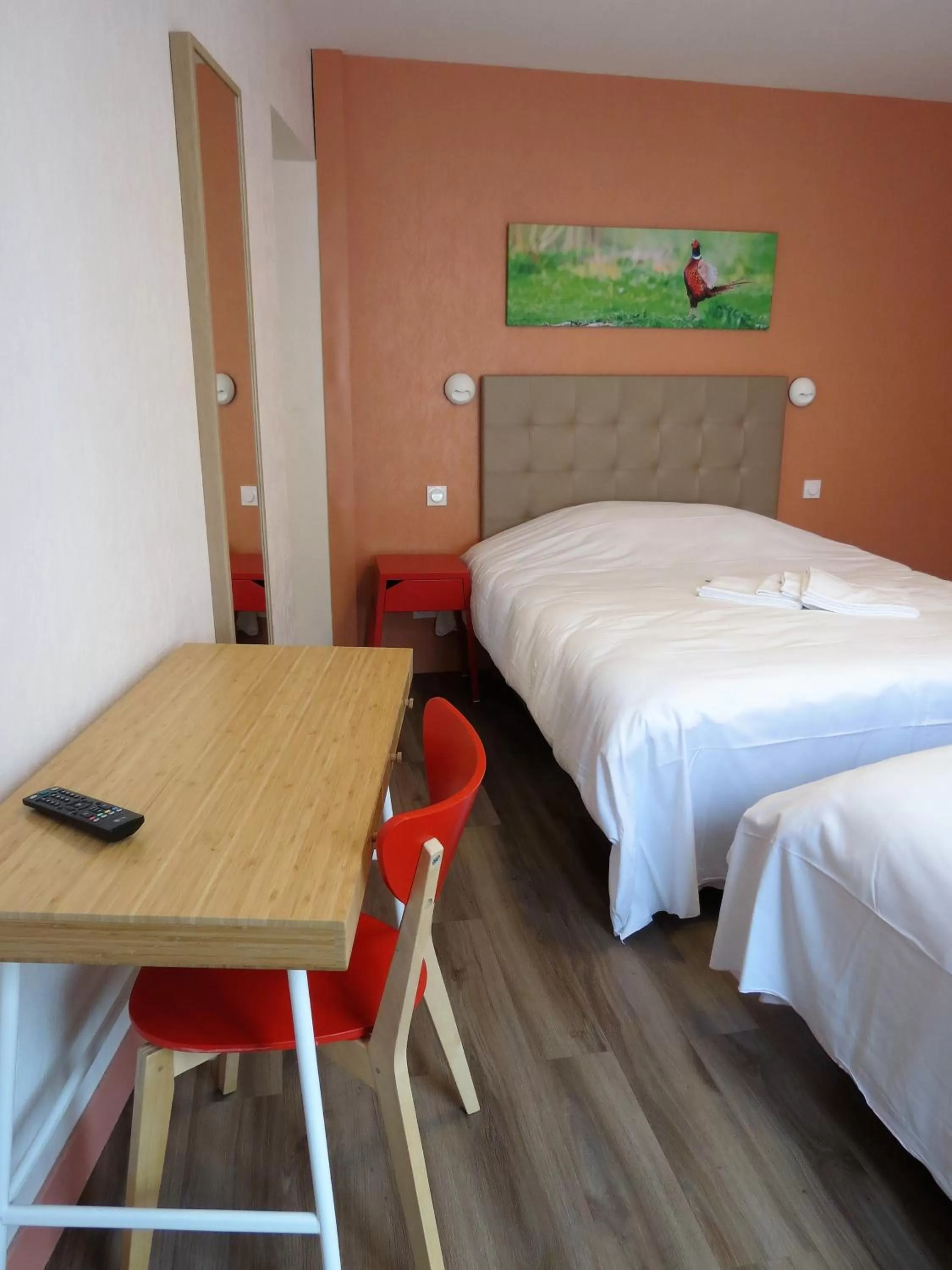 Bed in Hotel le Faisan