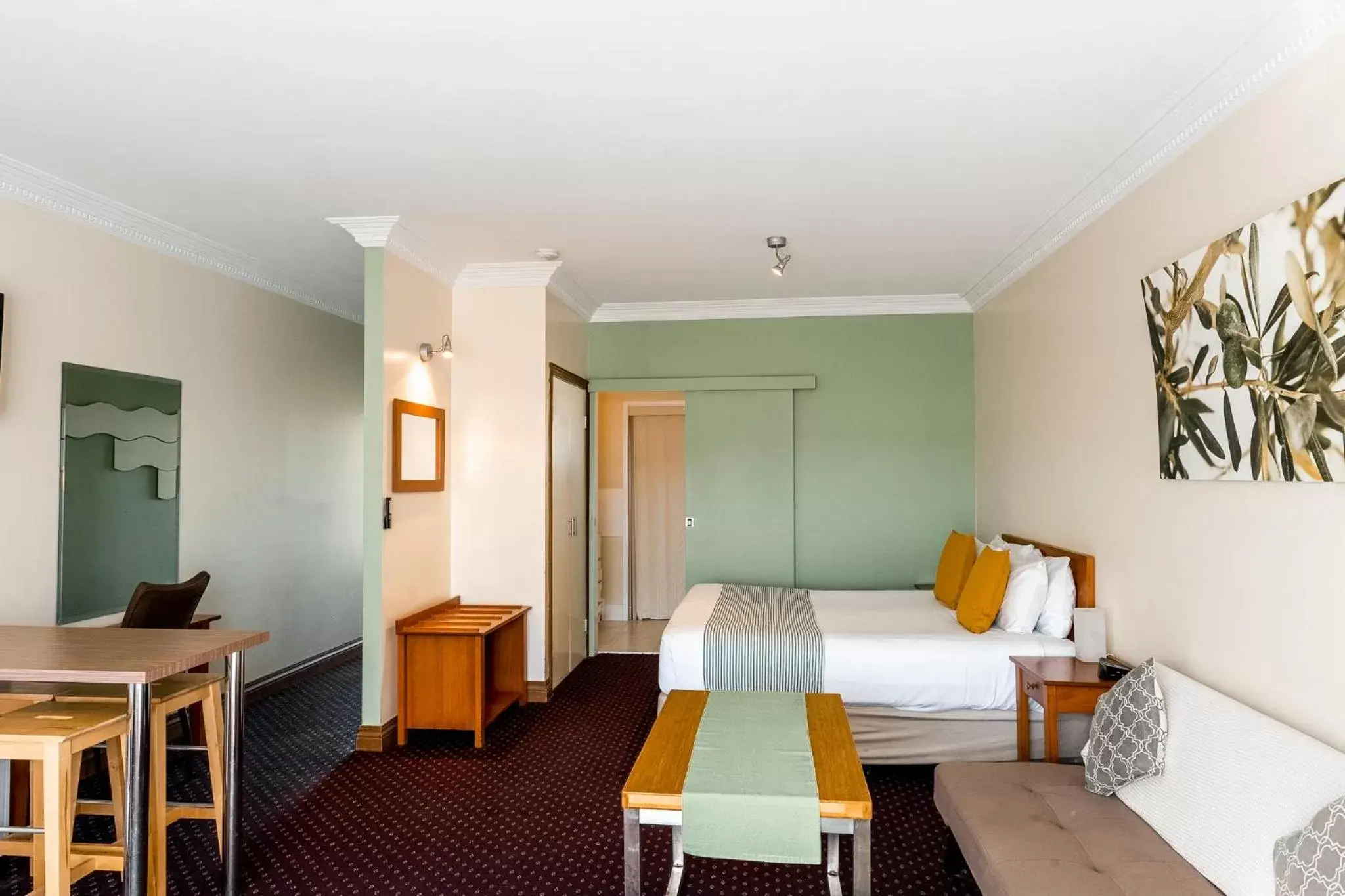 Bed, Seating Area in The Henry Parkes Tenterfield