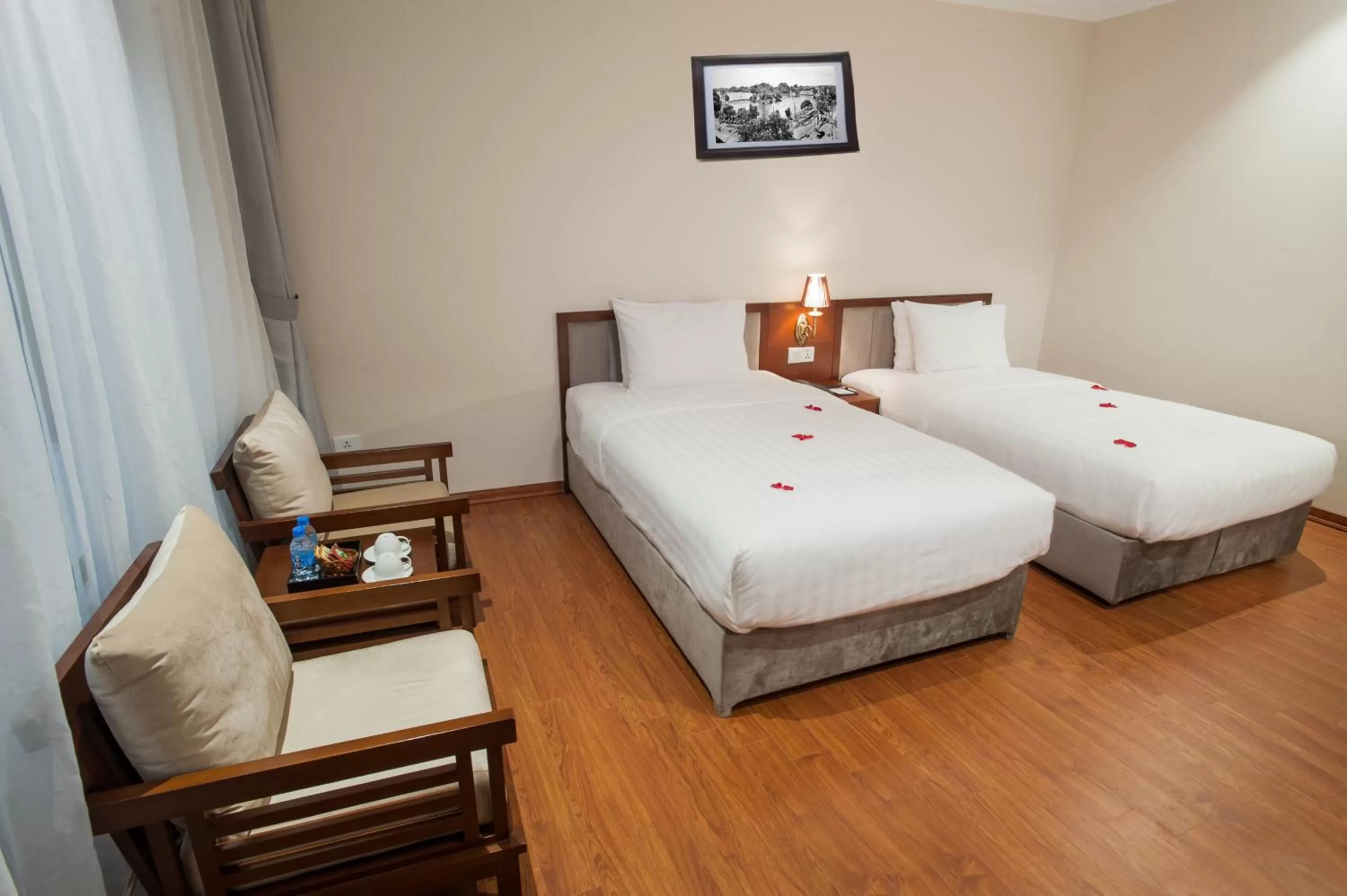 Bed, Room Photo in Mon Regency Hotel