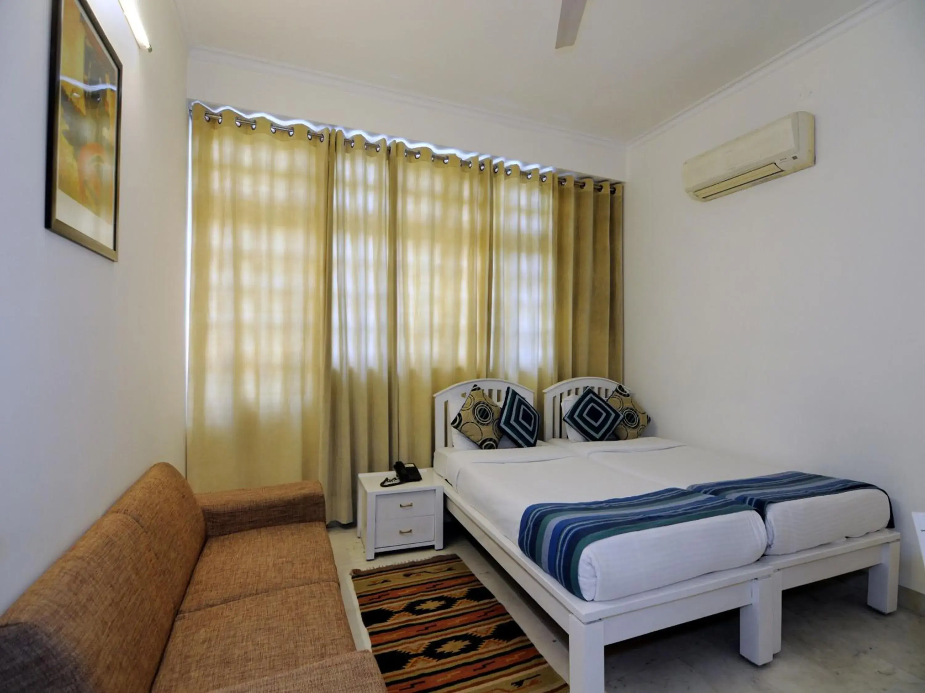 Bedroom, Bed in Mehra Residency At The Airport