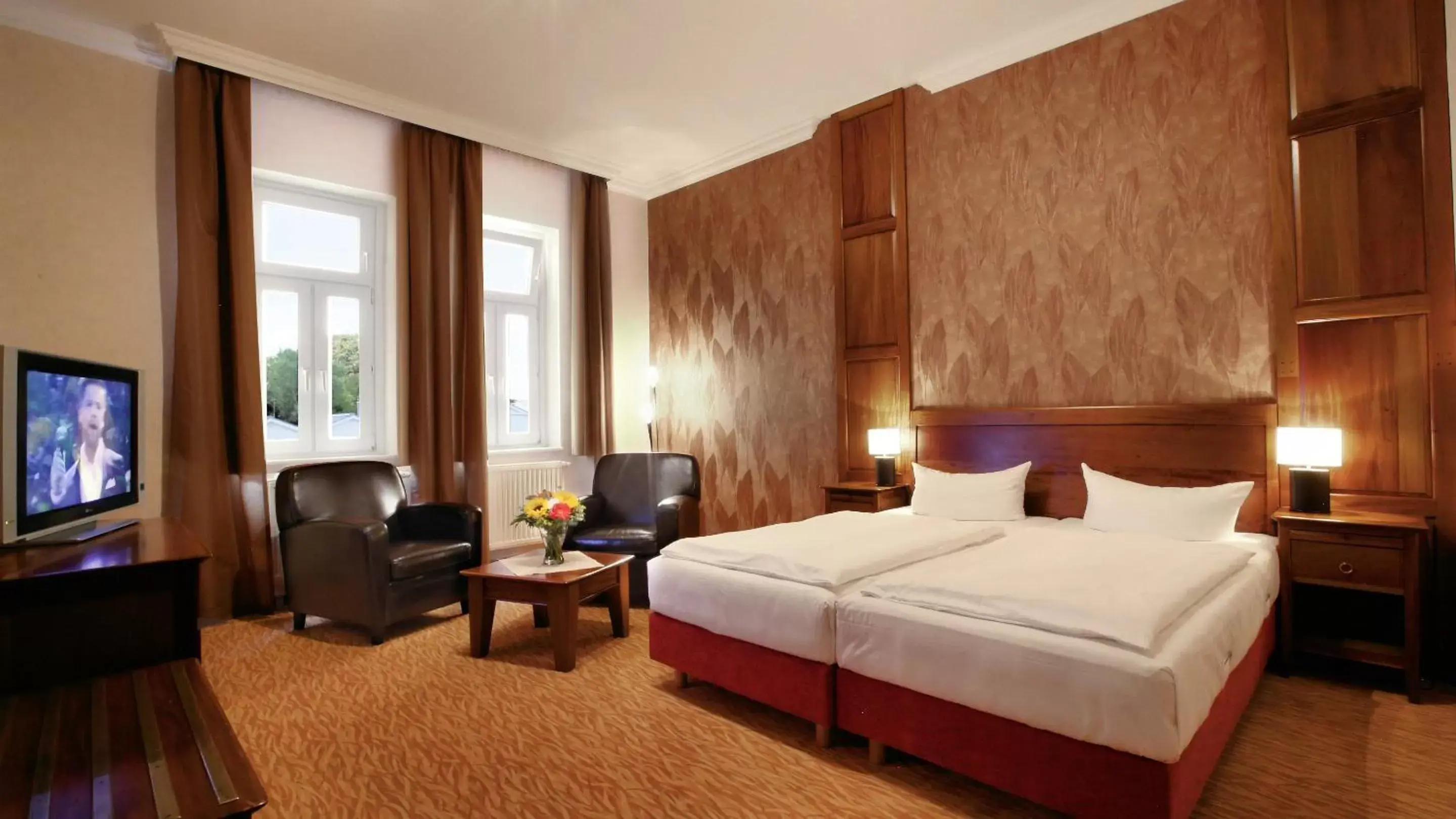 Photo of the whole room, Bed in Strandhotel Preussenhof