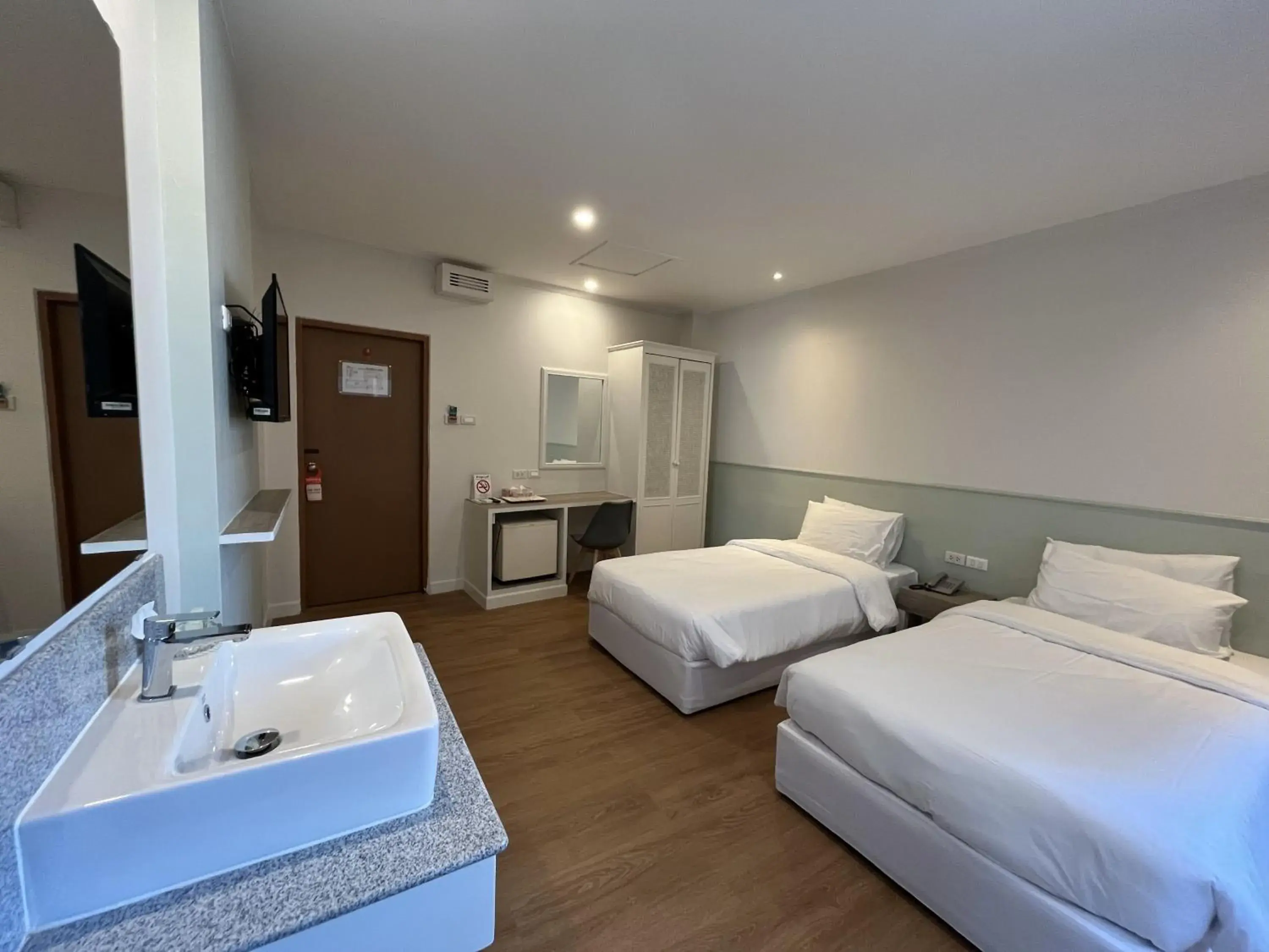 Bedroom, Bathroom in Dhevaraj Hotel