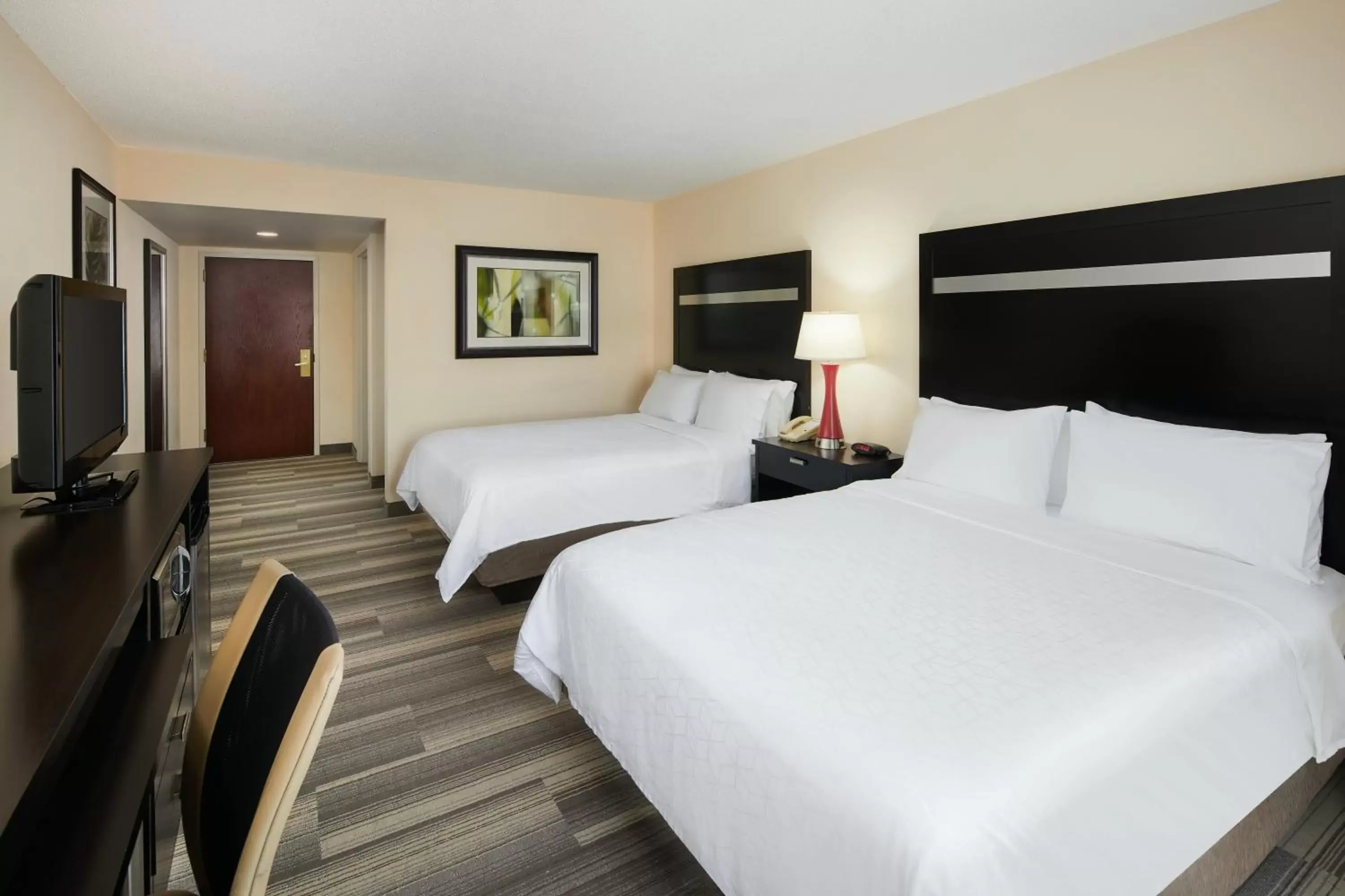 Bed in Holiday Inn Express & Suites I-26 & Us 29 At Westgate Mall, an IHG Hotel