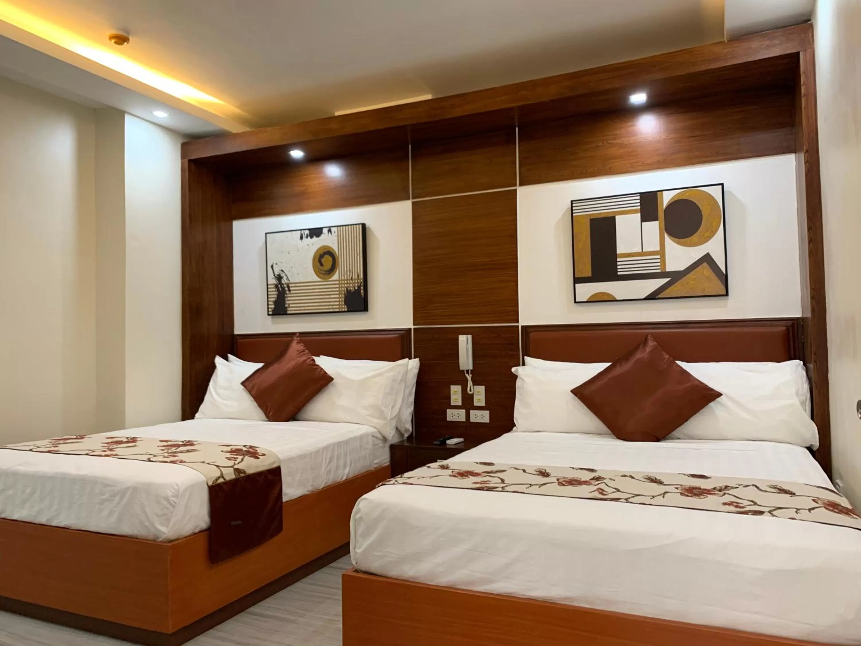 Bed in Rustic Crown Hotel