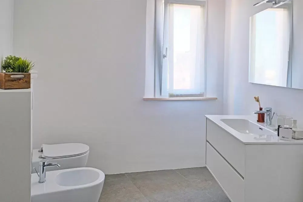 Bathroom in Amare Suite & Apartments