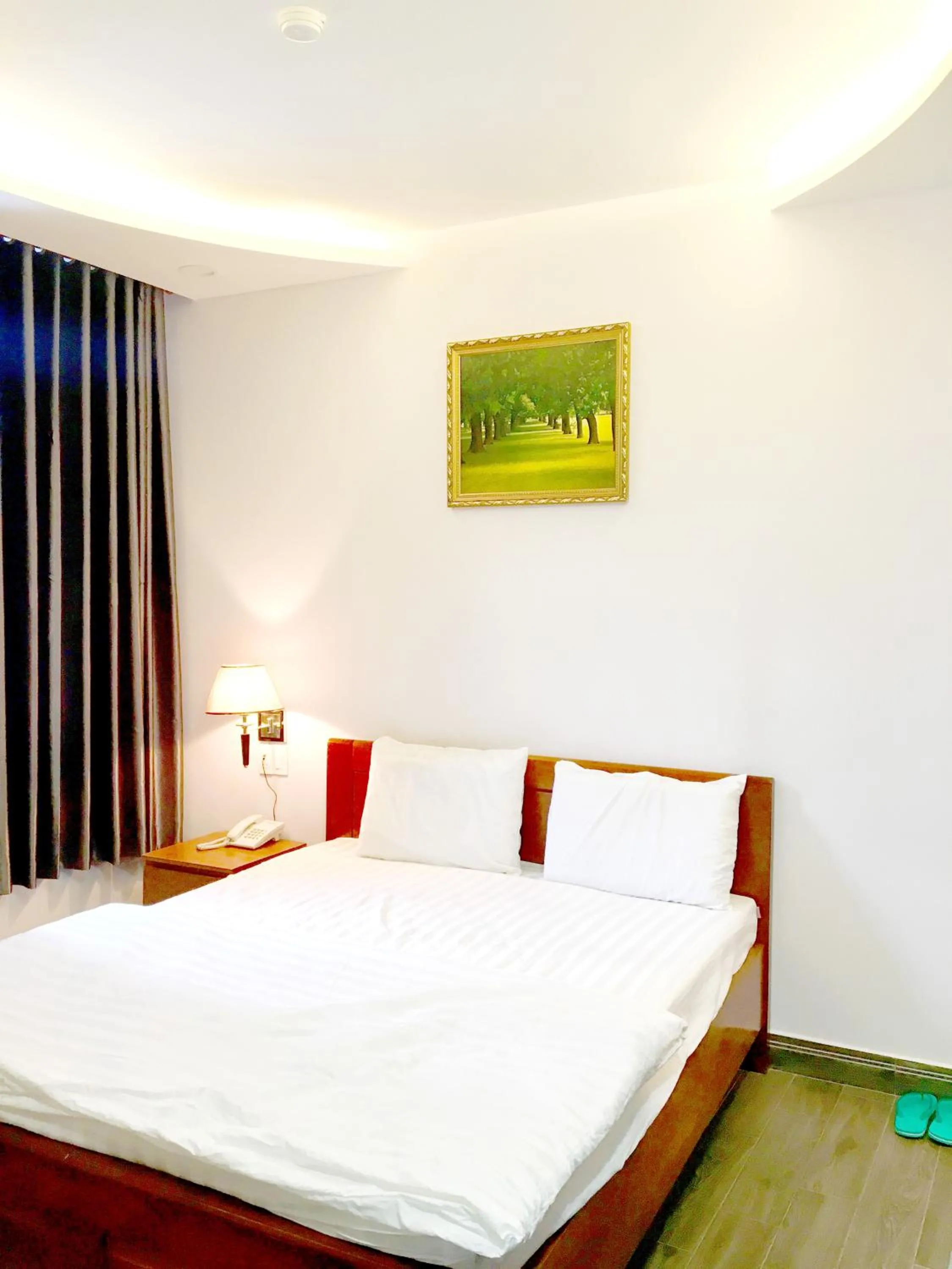 Bed in QUEEN VICTORIA Hotel