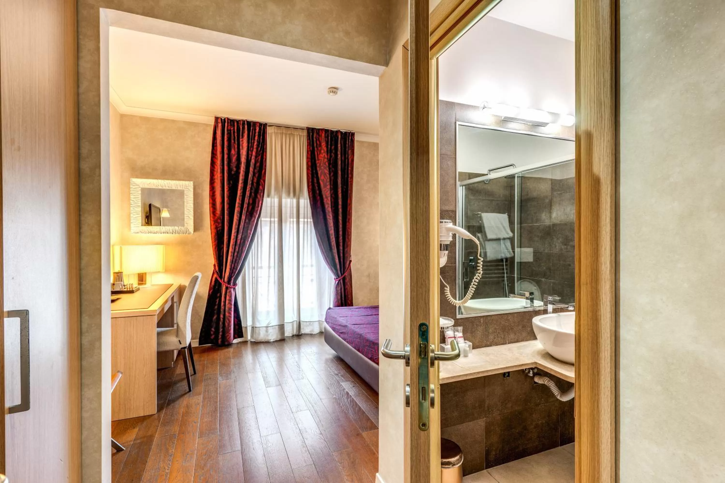 Bed in Roma Boutique Hotel