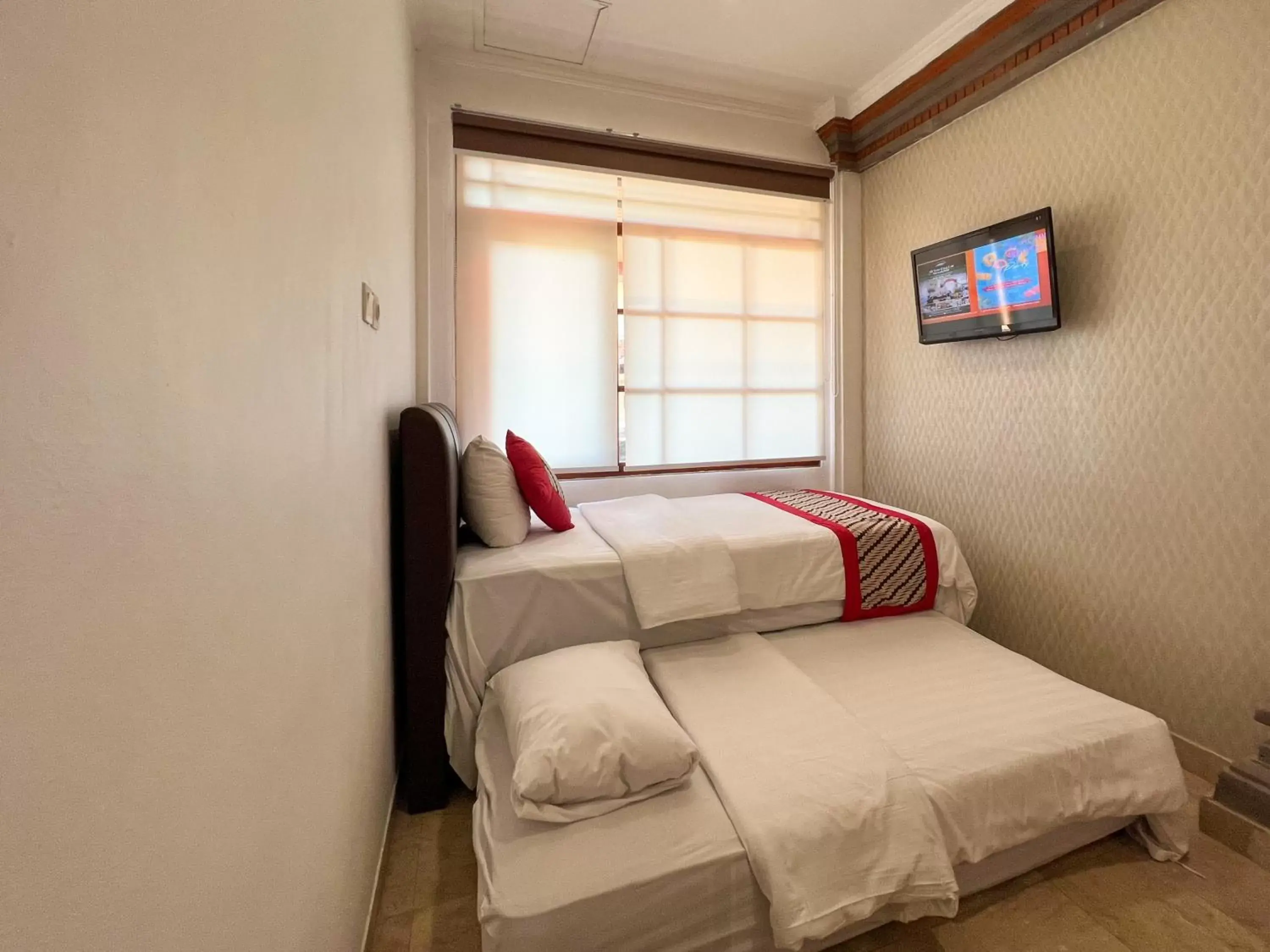 Bed in Grand Istana Rama Hotel