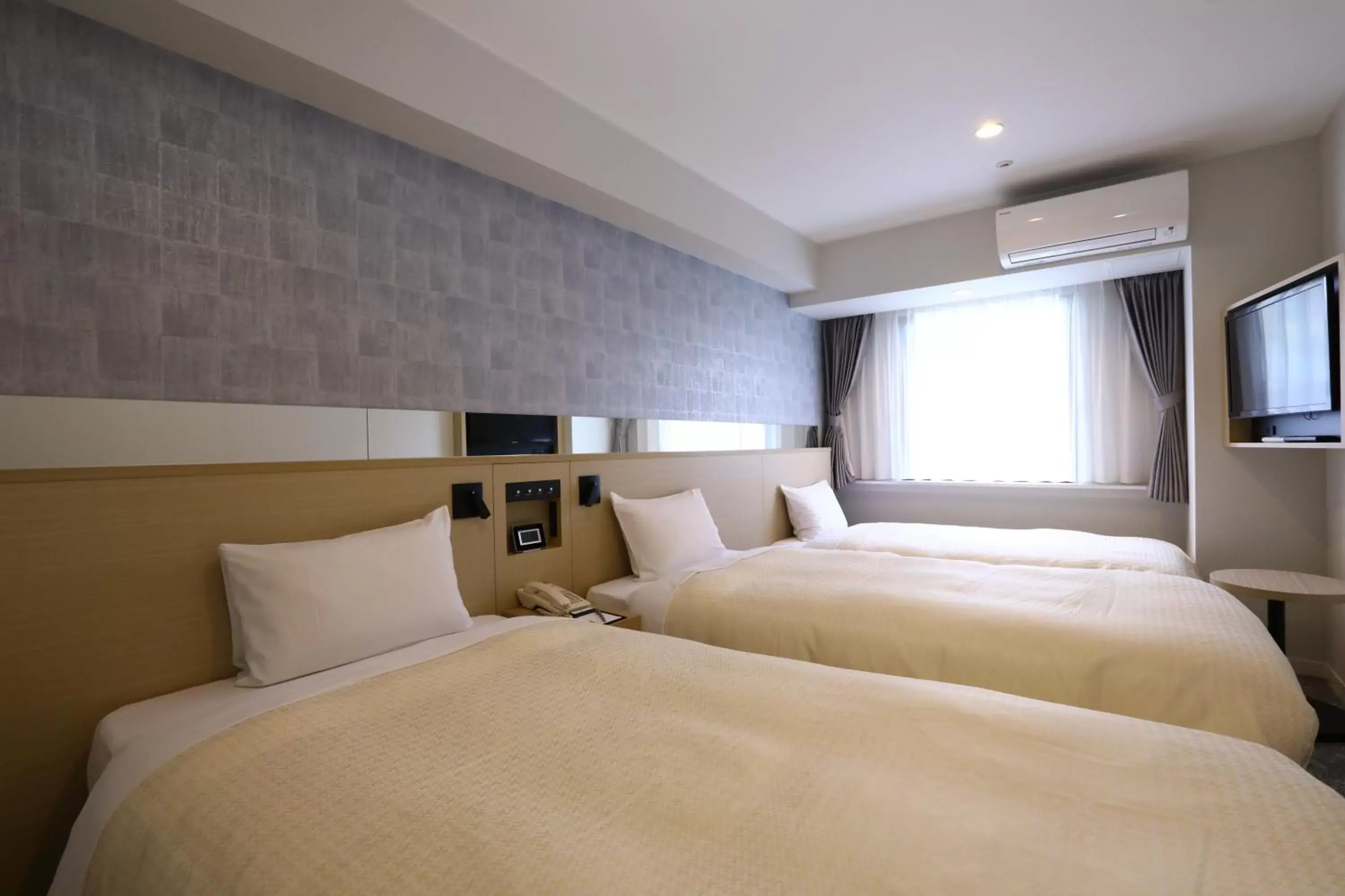 Bed in The Hedistar Hotel Narita