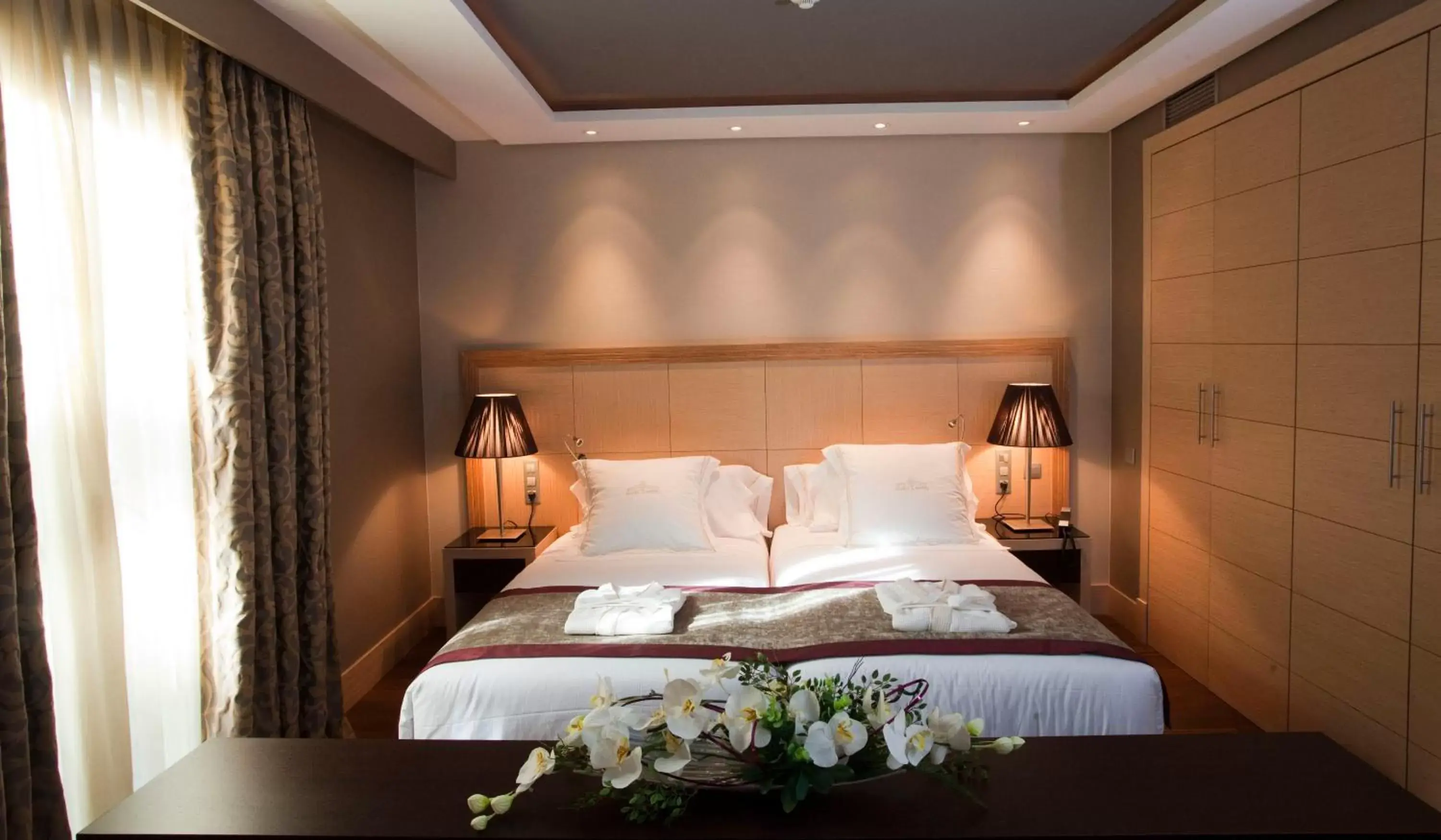 Photo of the whole room, Bed in Nexus Valladolid Suites & Hotel Photo of the whole room, Bed in Nexus Valladolid Suites & Hotel